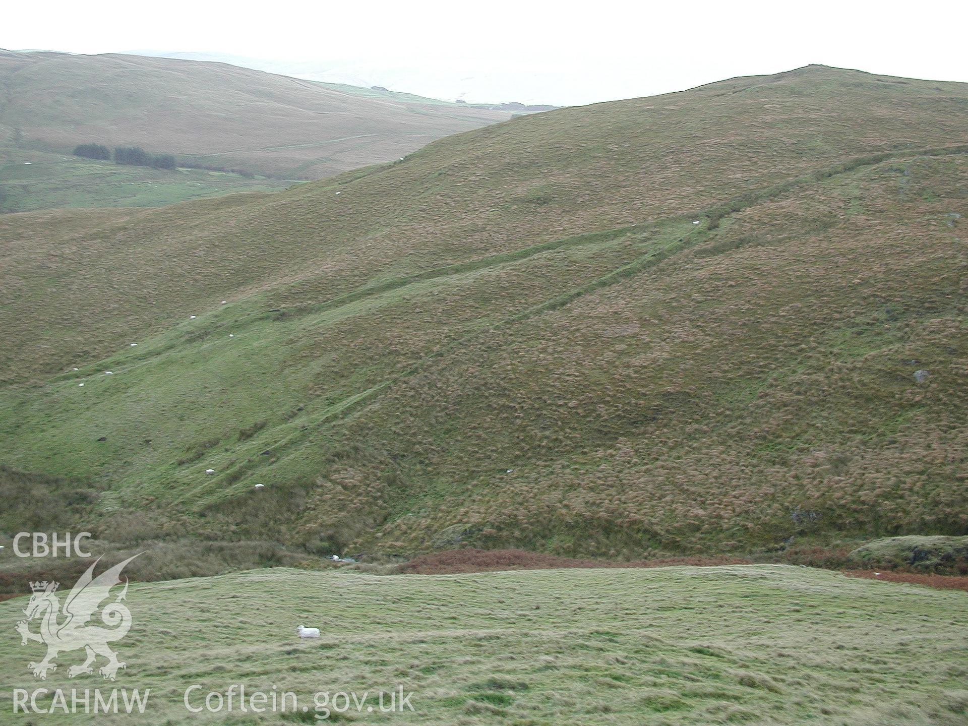 Photograph of Lluest Nant y Clehir Bank and Ditch taken on 08/10/2004 by R.S. Jones during an Upland Survey undertaken by Cambrian Archaeological Projects.