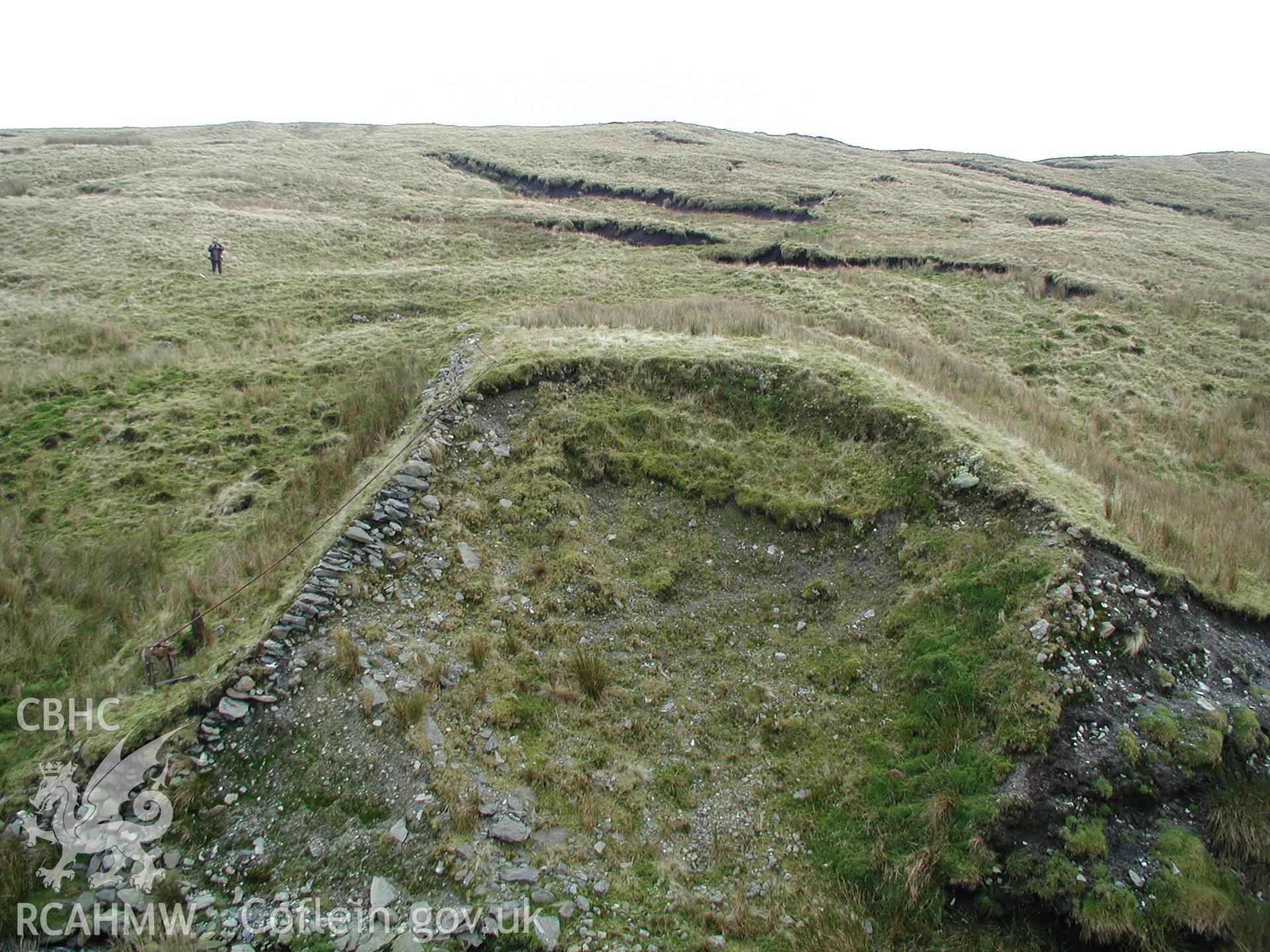 Photograph of Plynlimon Lead Mine Dam taken on 02/11/2004 by R.S. Jones during an Upland Survey undertaken by Cambrian Archaeological Projects.