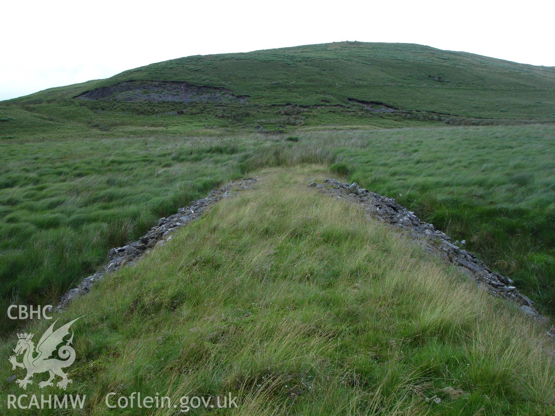 Photograph of Hyddgen Lead Mine Spoil Tip VIII taken on 06/07/2005 by R.P. Sambrook during an Upland Survey undertaken by Trysor Archaeology.