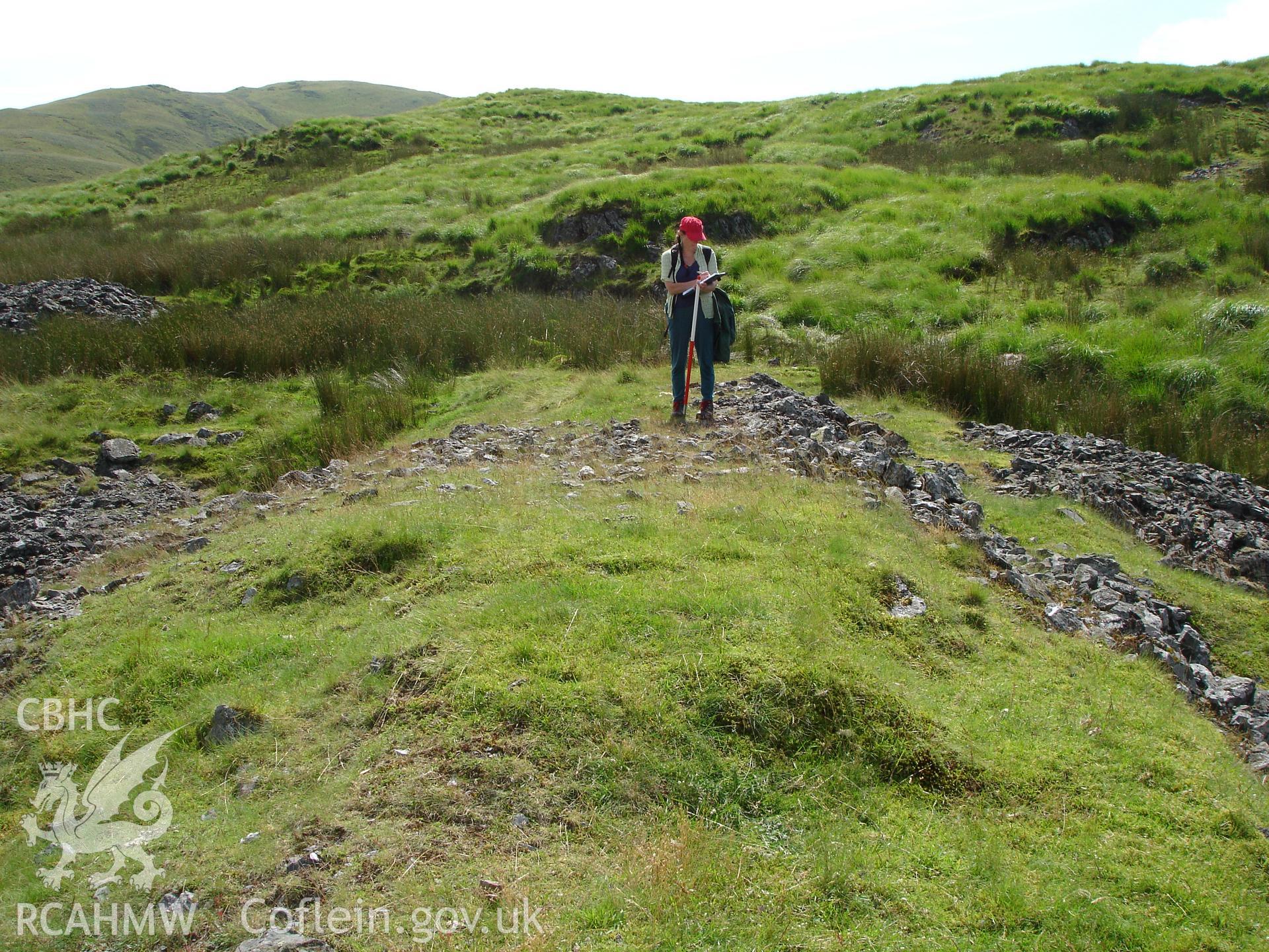 Photograph of Hyddgen Lead Mine Spoil Tip V taken on 08/07/2005 by R.P. Sambrook during an Upland Survey undertaken by Trysor Archaeology.