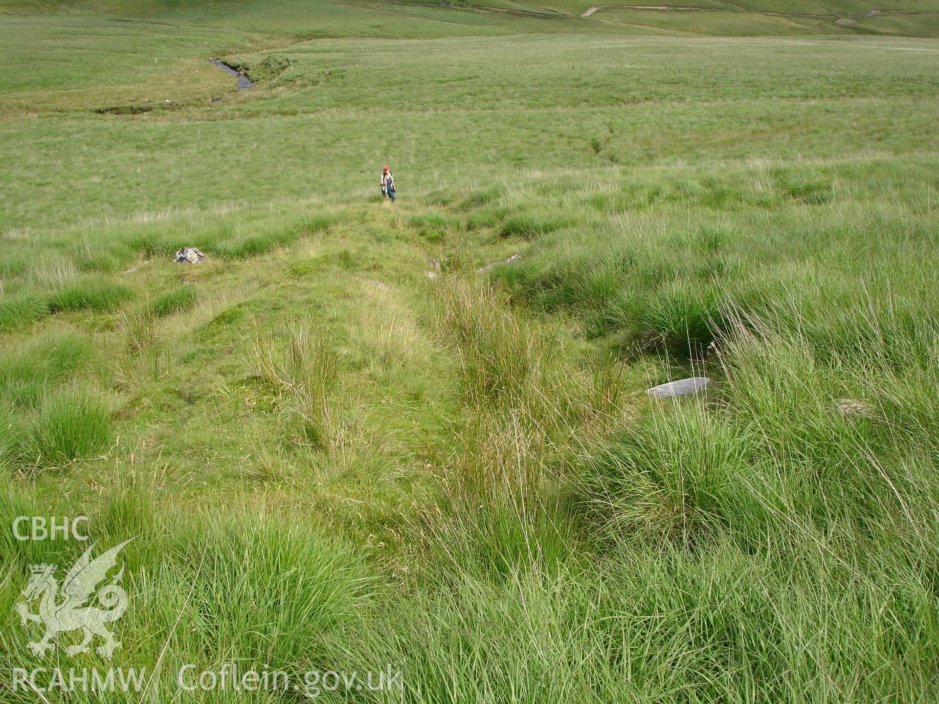 Photograph of Hyddgen Lead Mine Prospecting Trench III taken on 08/07/2005 by R.P. Sambrook during an Upland Survey undertaken by Trysor Archaeology.