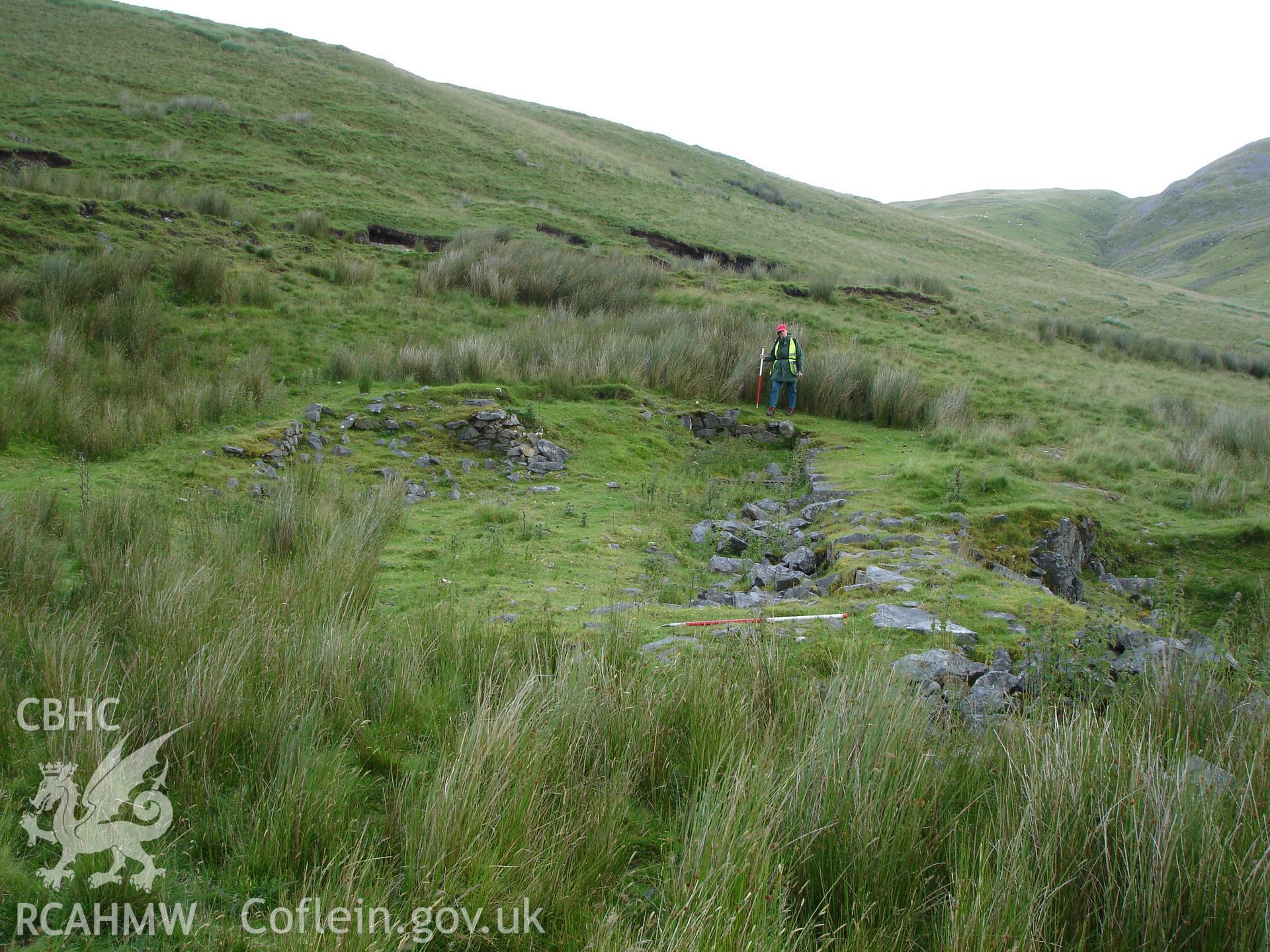 Photograph of Hyddgen Lead Mine Wheel Pit I taken on 06/07/2005 by R.P. Sambrook during an Upland Survey undertaken by Trysor Archaeology.