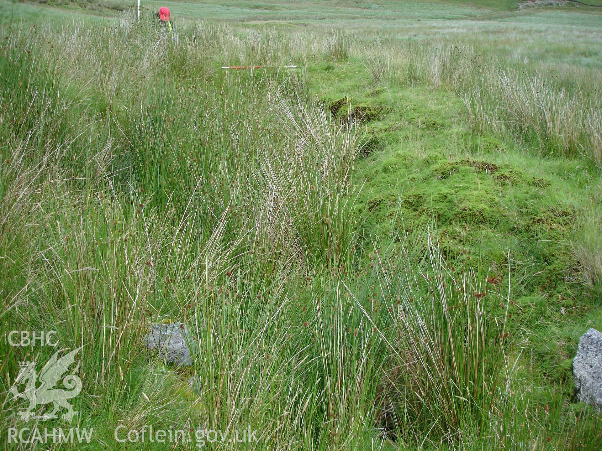 Photograph of Hyddgen Lead Mine Wheel Pit II taken on 06/07/2005 by R.P. Sambrook during an Upland Survey undertaken by Trysor Archaeology.