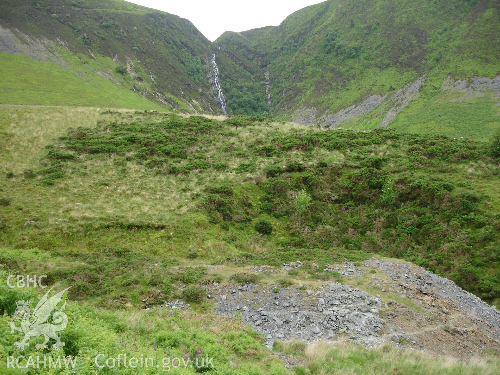 Photograph of Cwmrhaiader Lead Mine Spoil Tip II taken on 13/06/2005 by R.P. Sambrook during an Upland Survey undertaken by Trysor Archaeology.