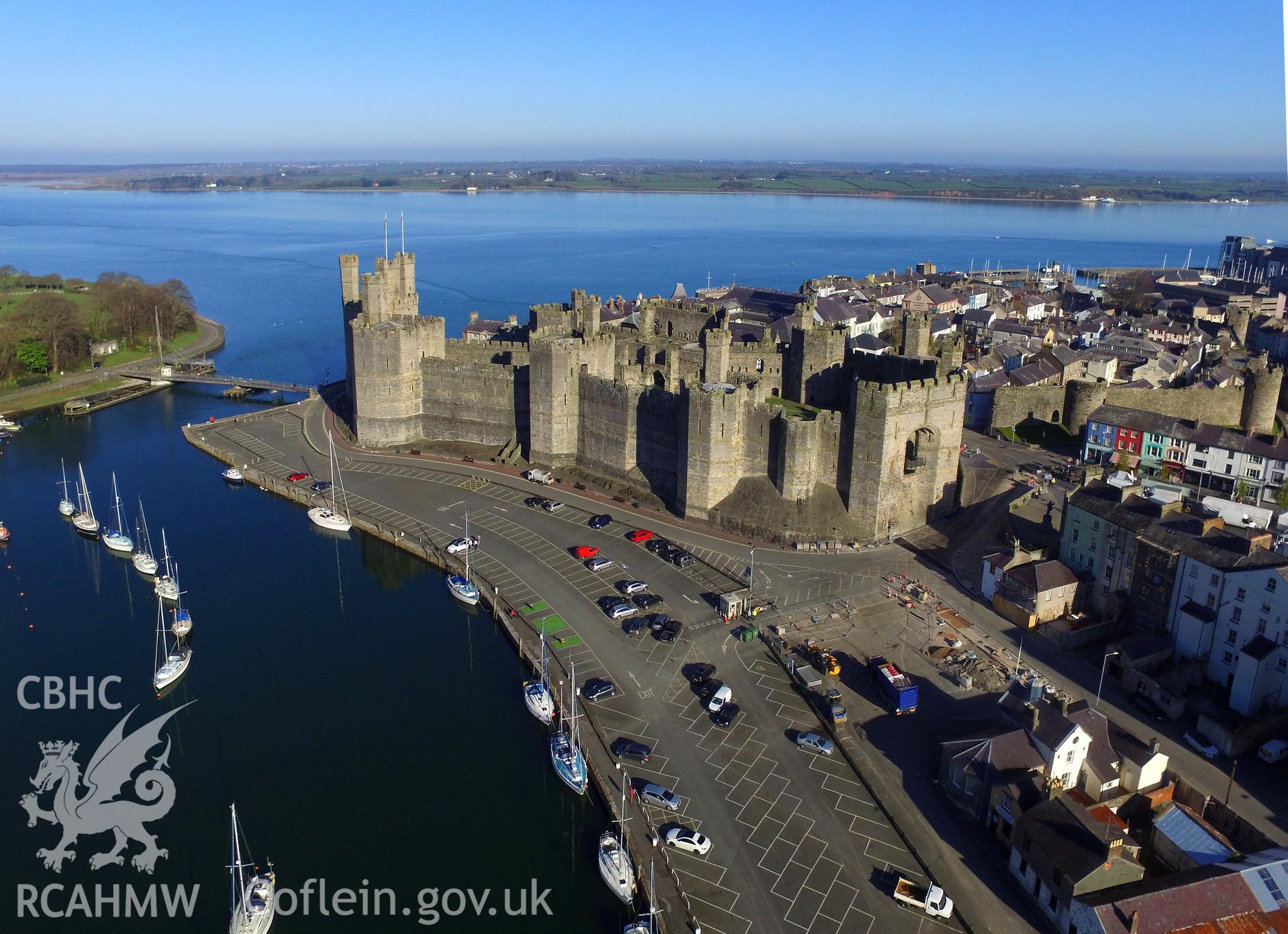 Colour photo showing Caernarfon Castle, produced by  Paul R. Davis,  8th April 2017.