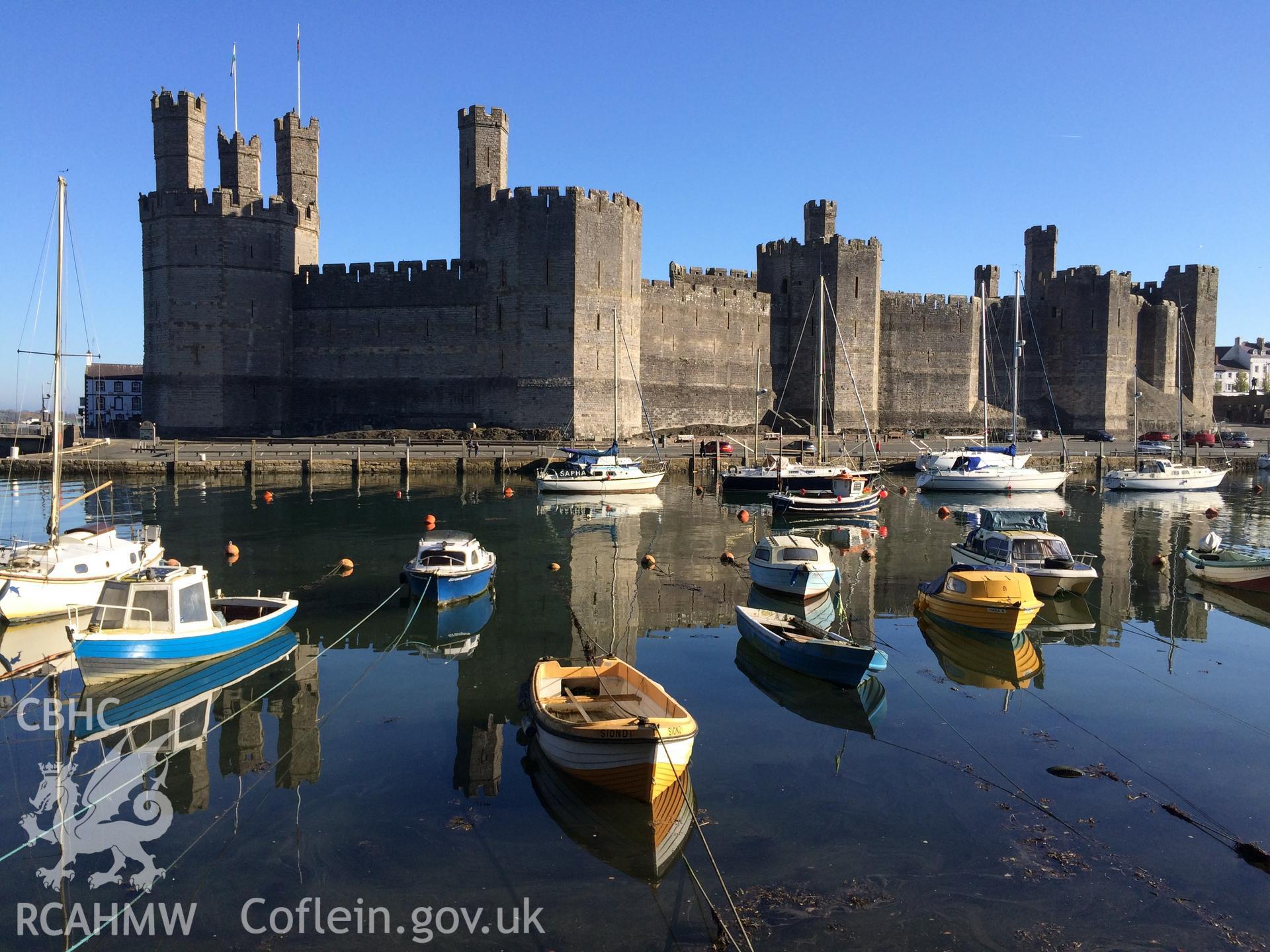 Colour photo showing Caernarfon Castle, produced by  Paul R. Davis,  8th April 2017.