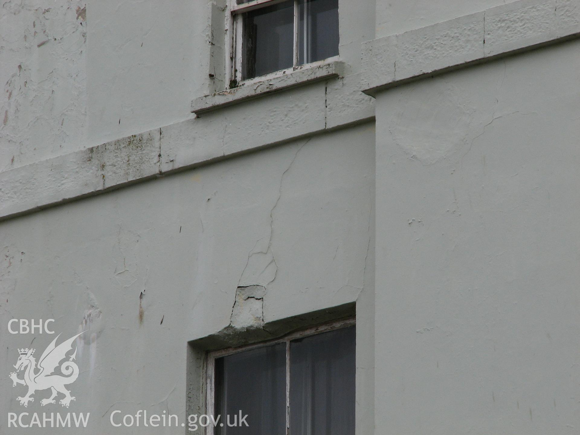 Colour digital photograph showing the damaged rear of the Royal Gatehouse Hotel.