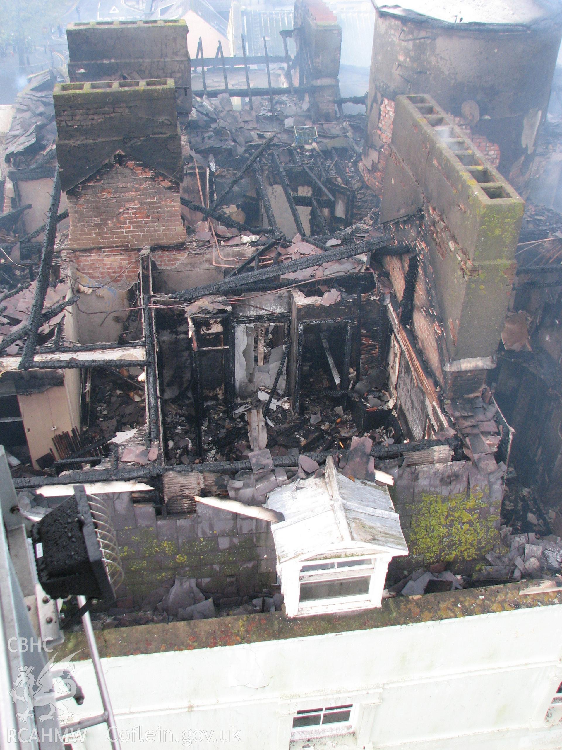Colour digital photograph showing the damage caused by fire to the exterior of the Royal Gatehouse Hotel.