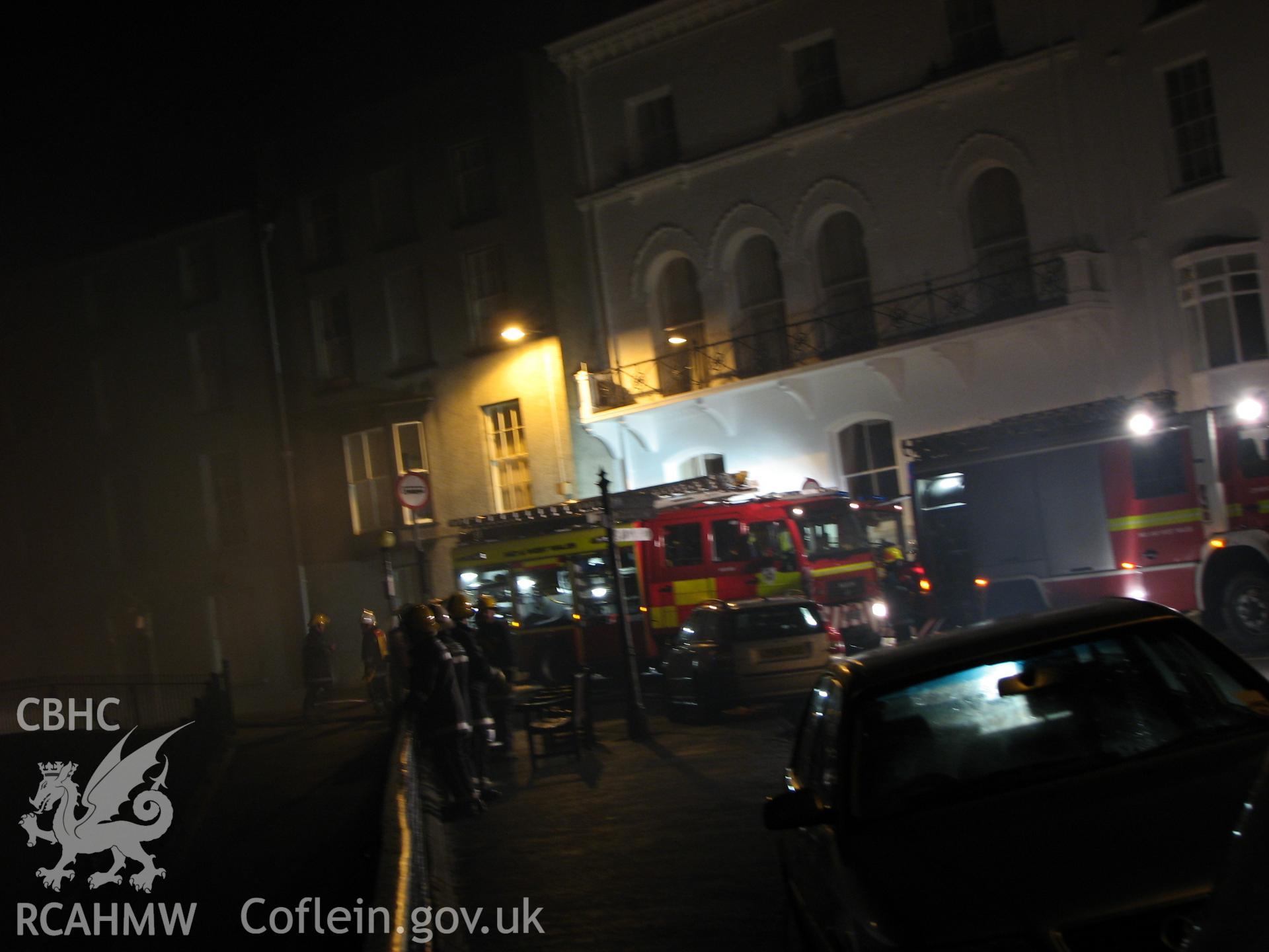 Colour digital photograph of The Royal Gatehouse Hotel, on fire.