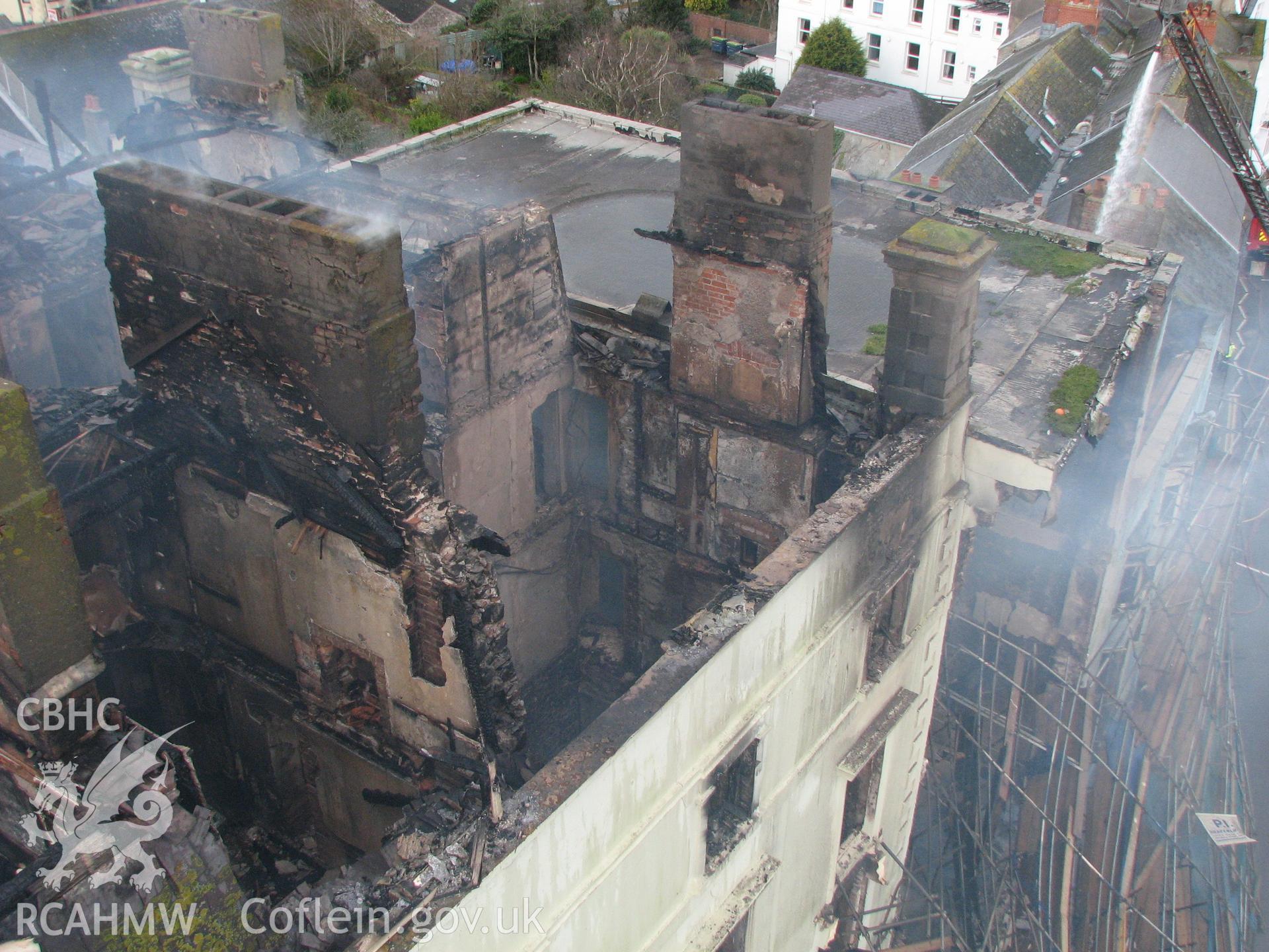 Colour digital photograph showing the damage caused by fire to the exterior of the Royal Gatehouse Hotel.