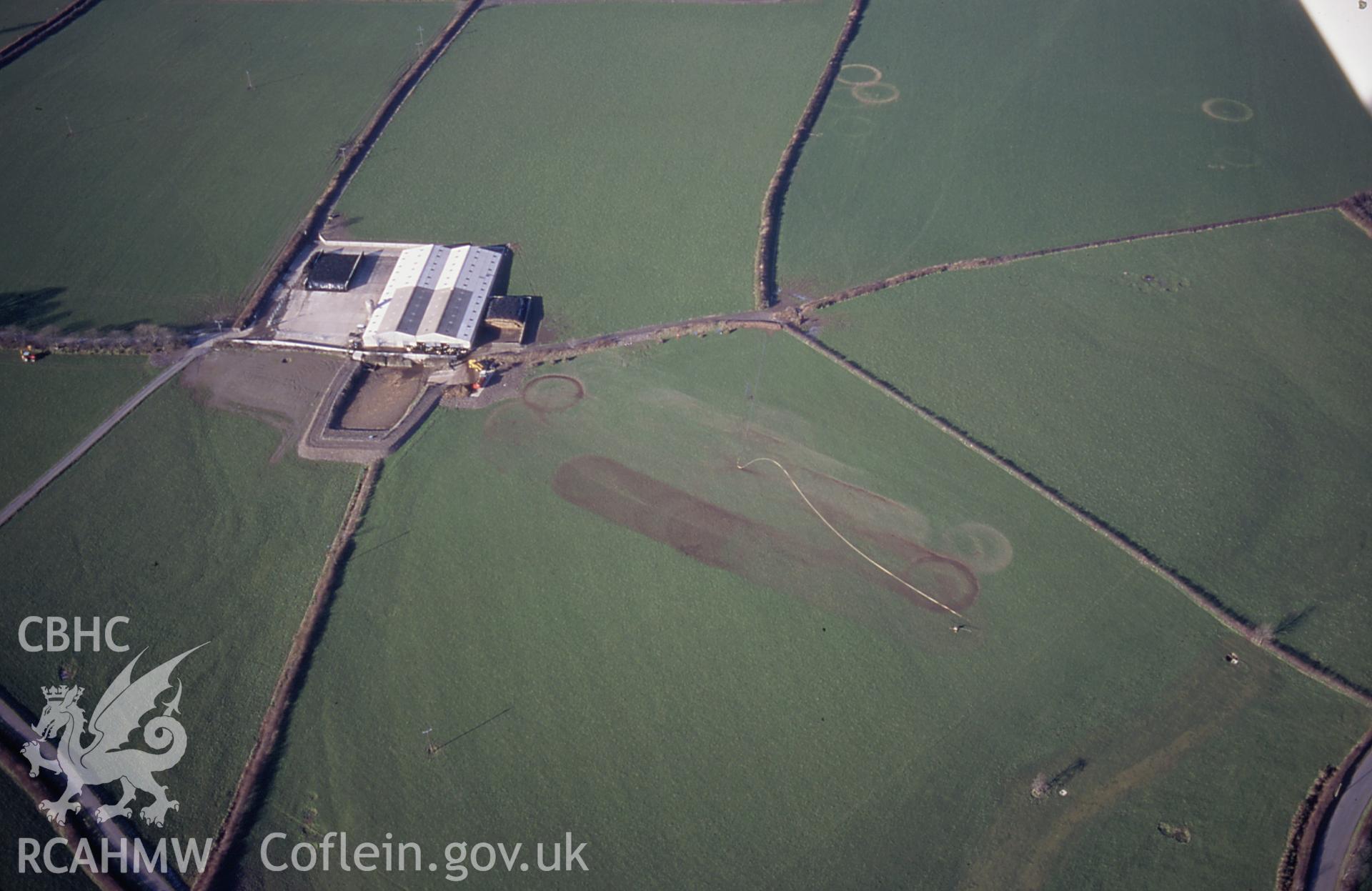 RCAHMW colour slide oblique aerial photograph of irrigation marks at The West Farm, Wiston, taken on 27/01/1998 by Toby Driver