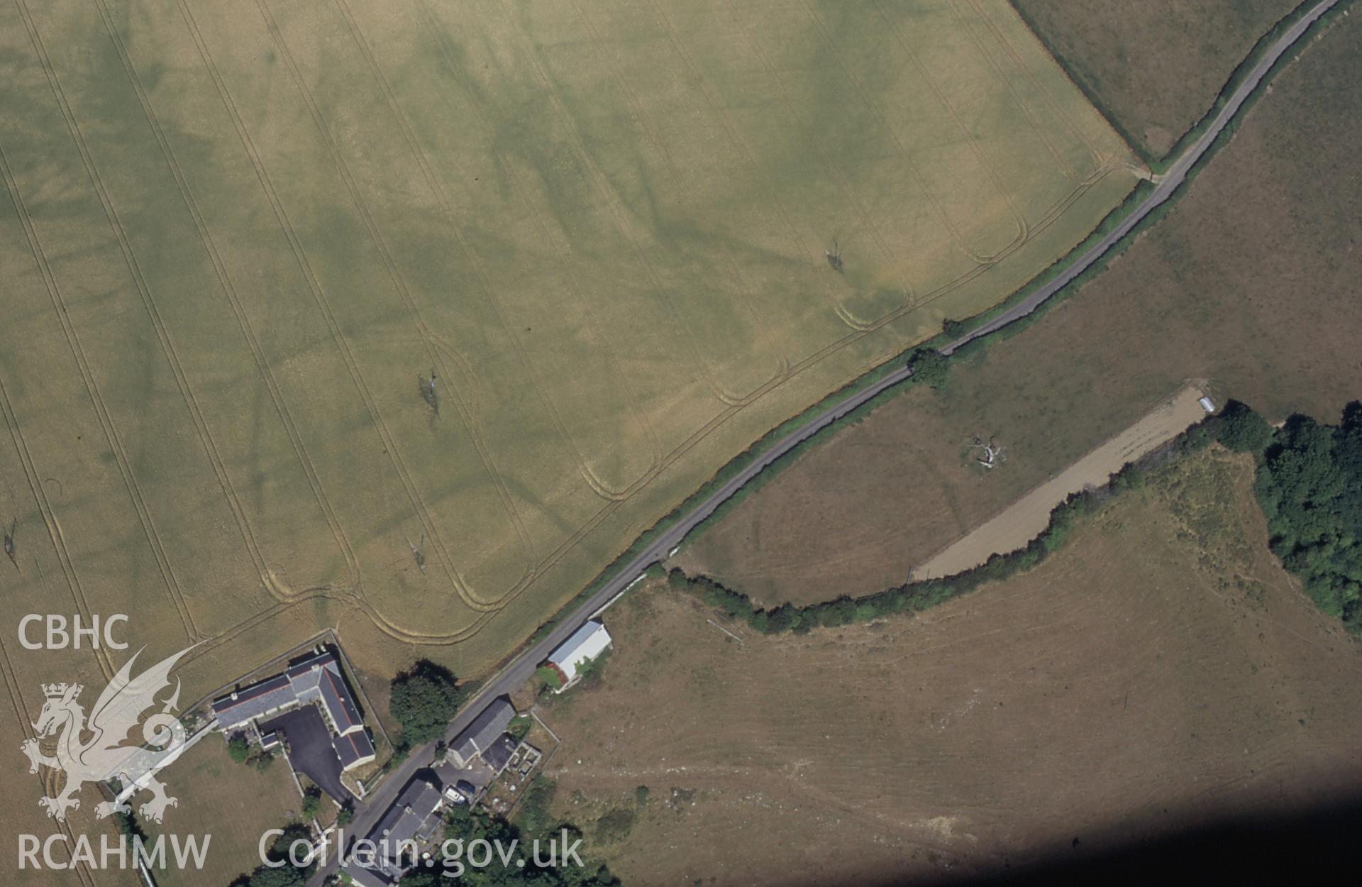 RCAHMW colour slide oblique aerial photograph of cropmark enclosure I at Cliff House, Llancarfan, taken by C.R.Musson on the 25/07/1996