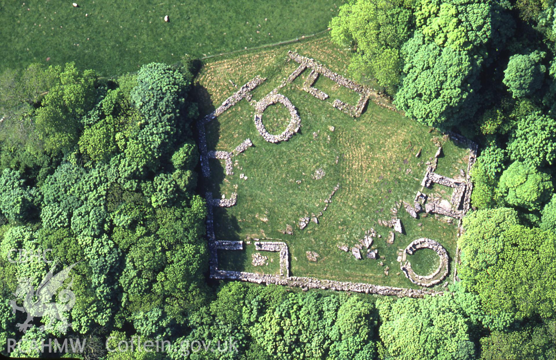 Slide of RCAHMW colour oblique aerial photograph of Din Lligwy Ancient Village, taken by C.R. Musson, 30/5/1994.