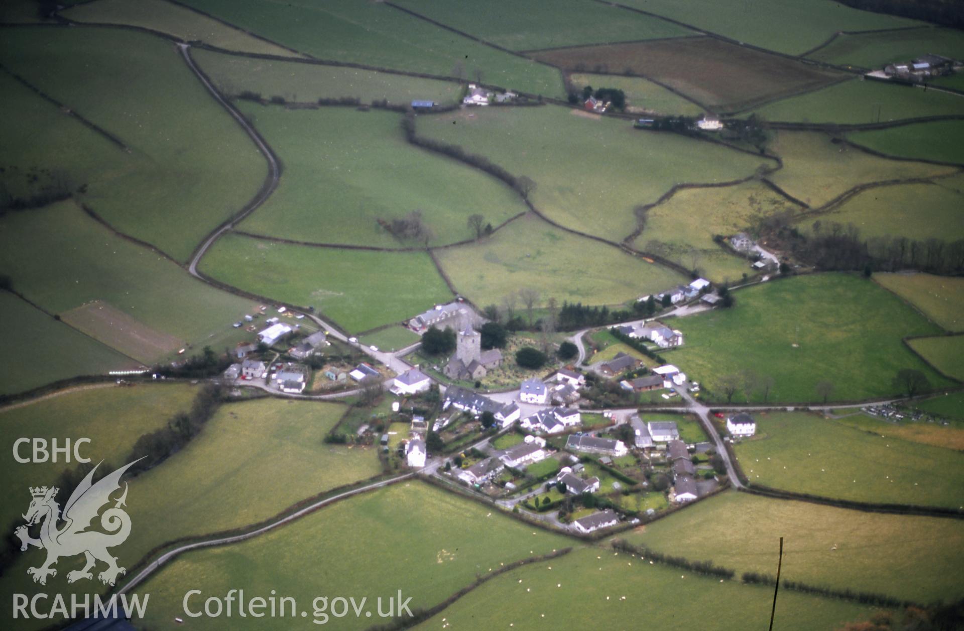RCAHMW colour slide oblique aerial photograph of Llanfihangel-y-creuddyn, taken on 19/03/1999 by Toby Driver