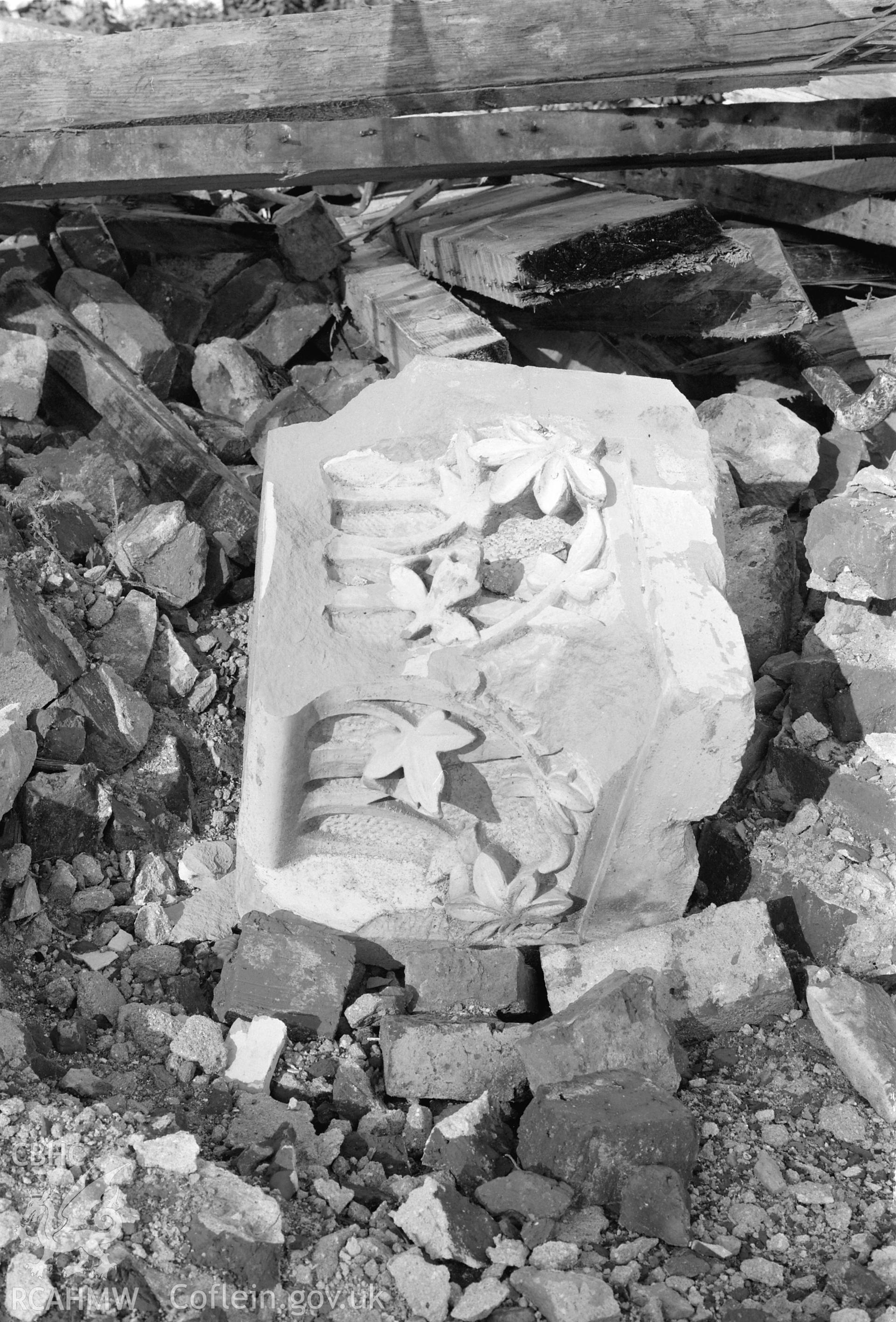 Fragment of masonry decorated with flowers