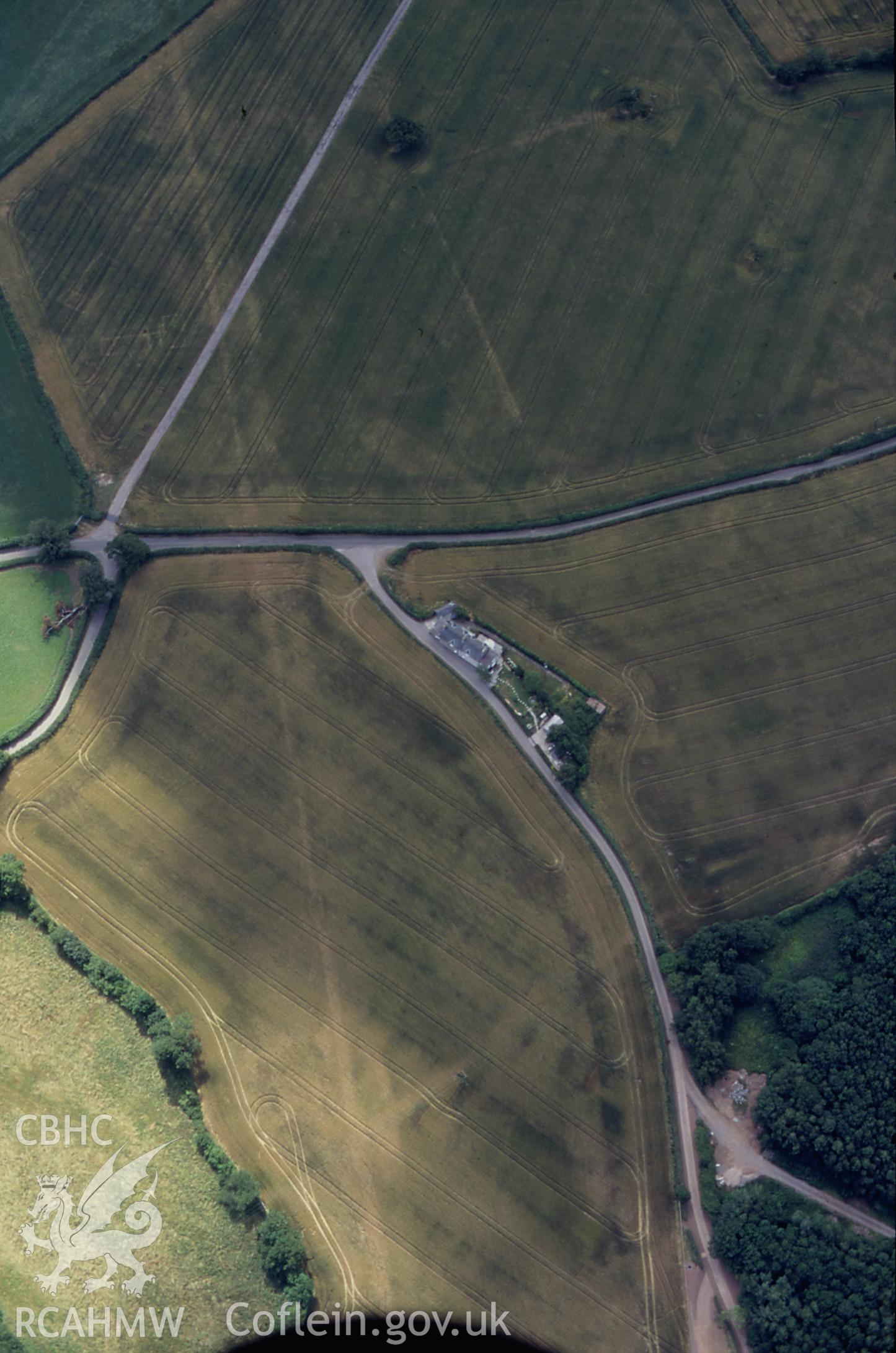 RCAHMW colour slide oblique aerial photograph of Croes Carn Einion Villa, Graig, taken by C.R.Musson on the 24/07/1996