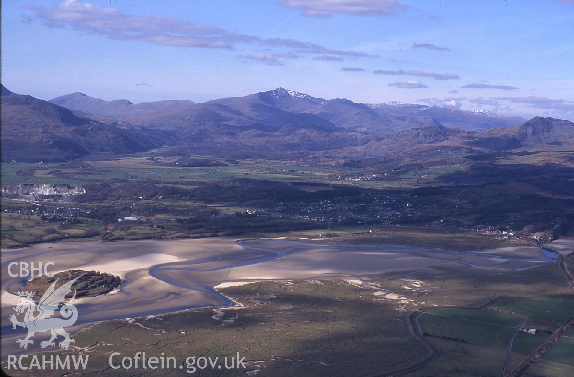 RCAHMW colour slide oblique aerial photograph of farmhouse on Ynys Gifftan, Talsarnau, taken by C.R.Musson on the 30/03/1996