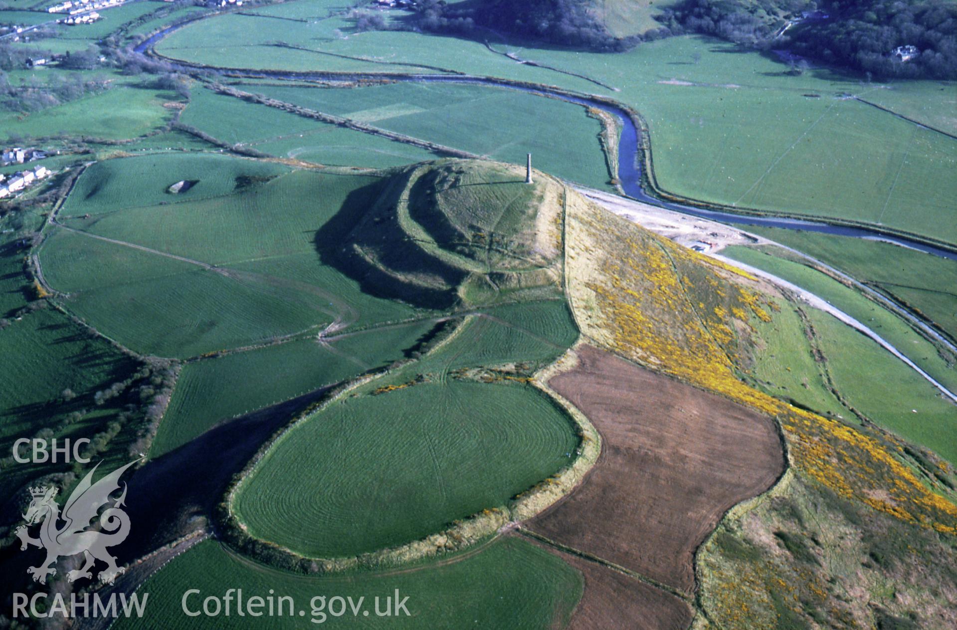 Slide of RCAHMW colour oblique aerial photograph of Pen Dinas Camp, taken by C.R. Musson, 25/4/1989.