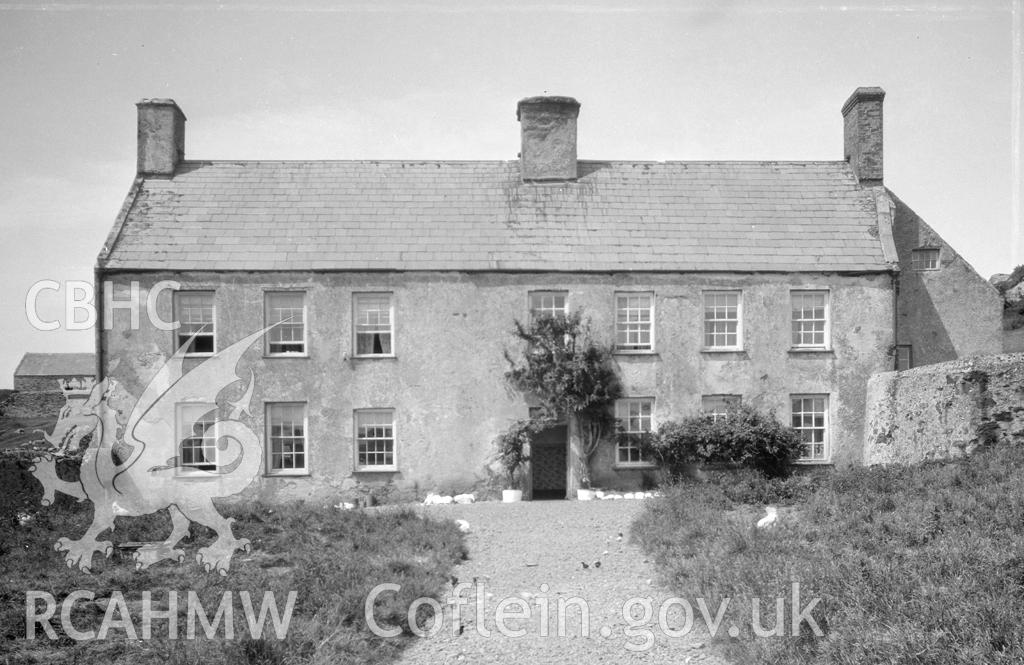 Descriptive account of Mynachdy, Llanfairyngornwy, includuing investigator's report, pencil sketch plan, black and white photograph, photocopy of extract from RCAHMW inventory, and ink sketches of staircase, skirting, and cornice.