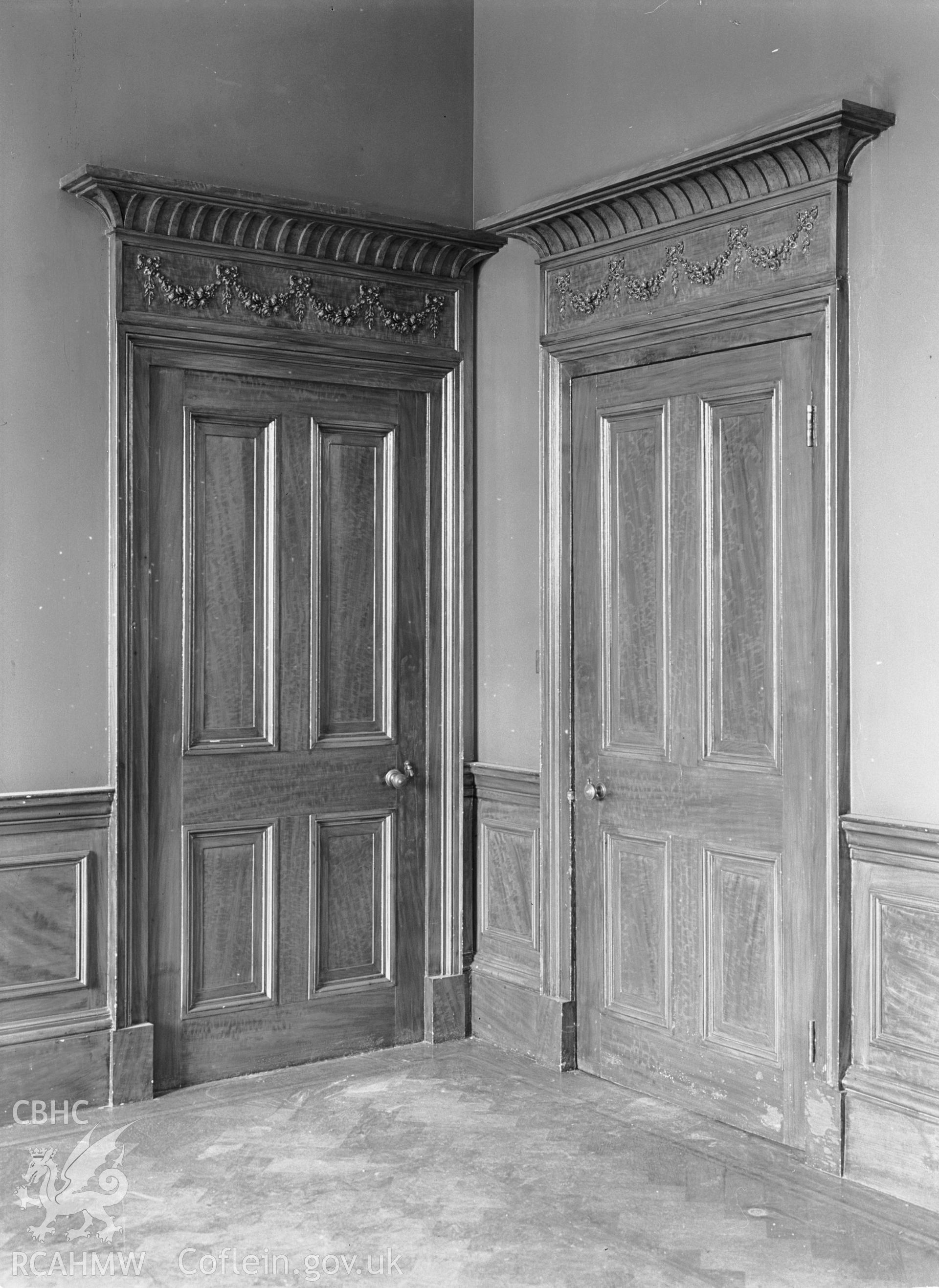 Interior view showing detail of door in the dining room.