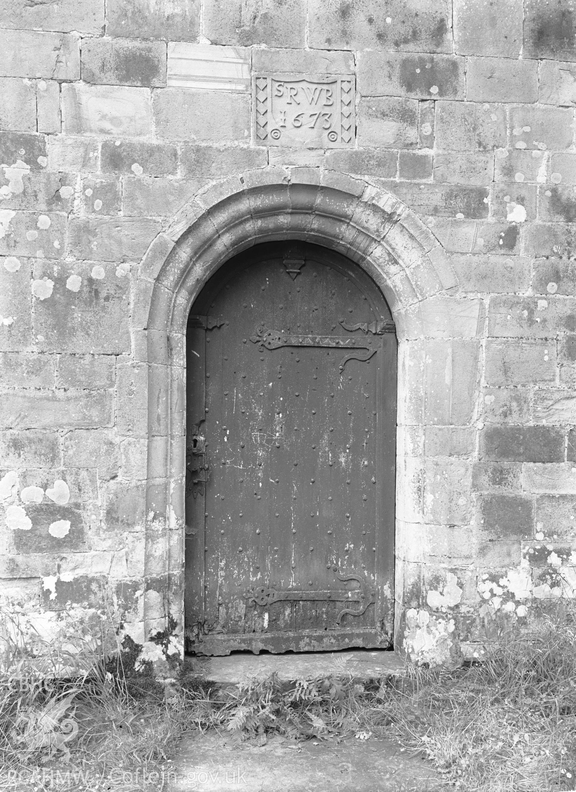 Exterior view showing nrth door,with inscription, SRWB 1673.