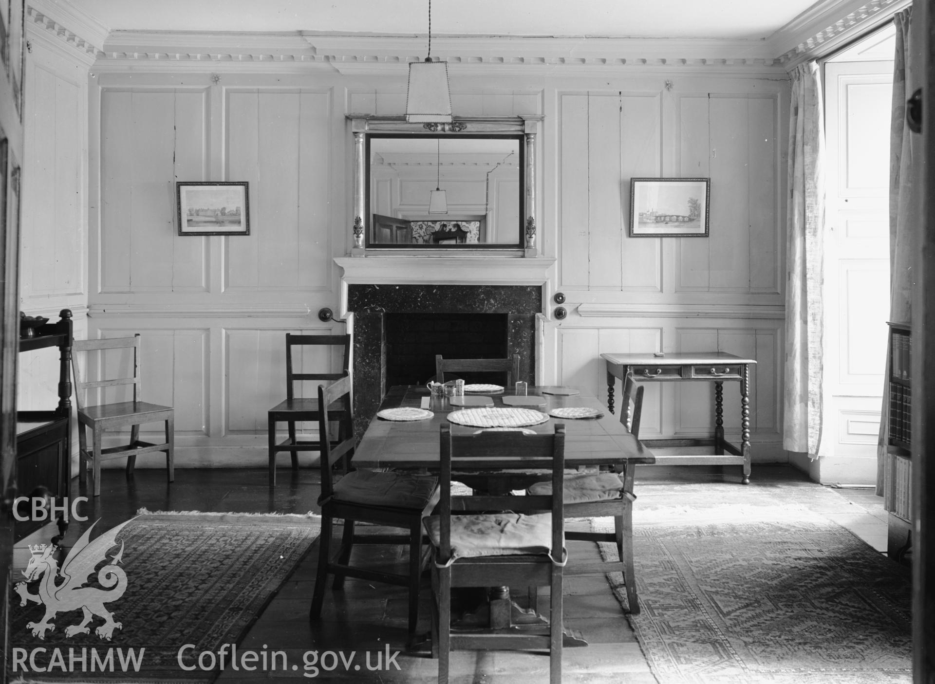 Interior view showing panelled dining room.