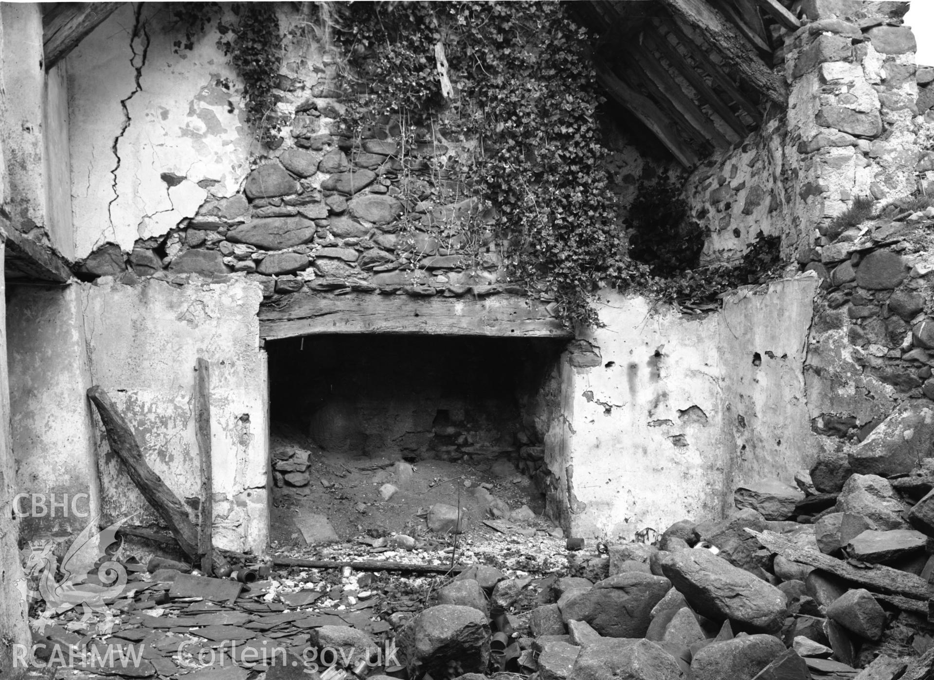 Interior view of ruins showing fireplace at north end