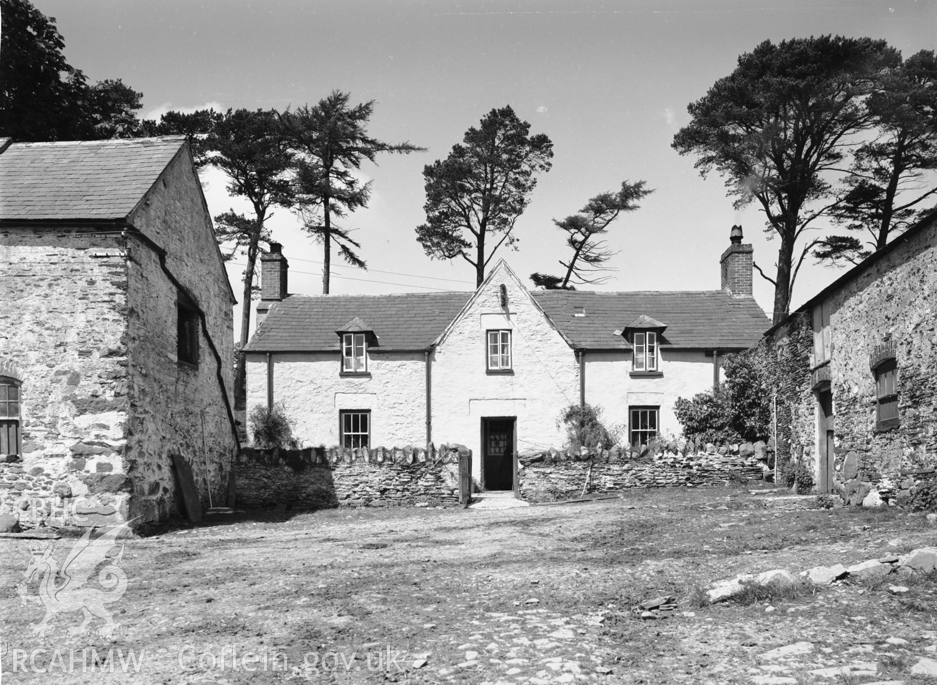 One black and white photograph of Rhos-Yn-Mawn, Llangernyw. Negative held.