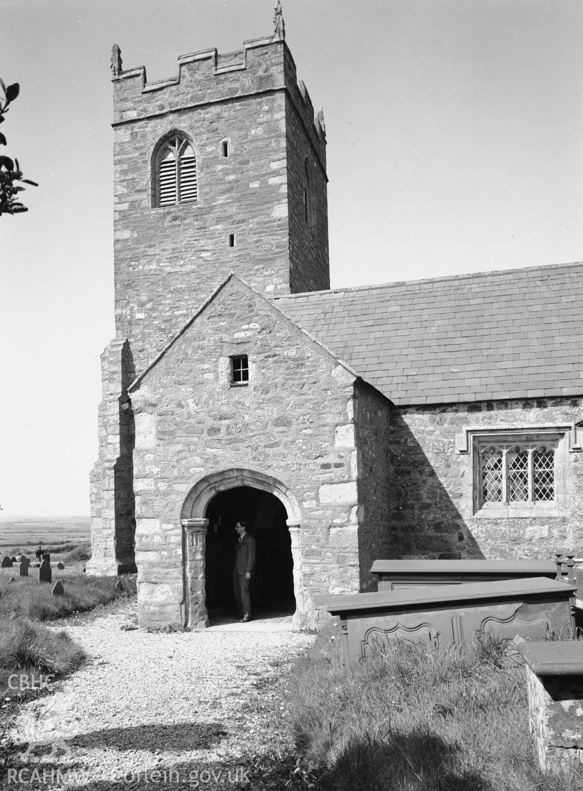 Exterior view showing the south porch and the tower.