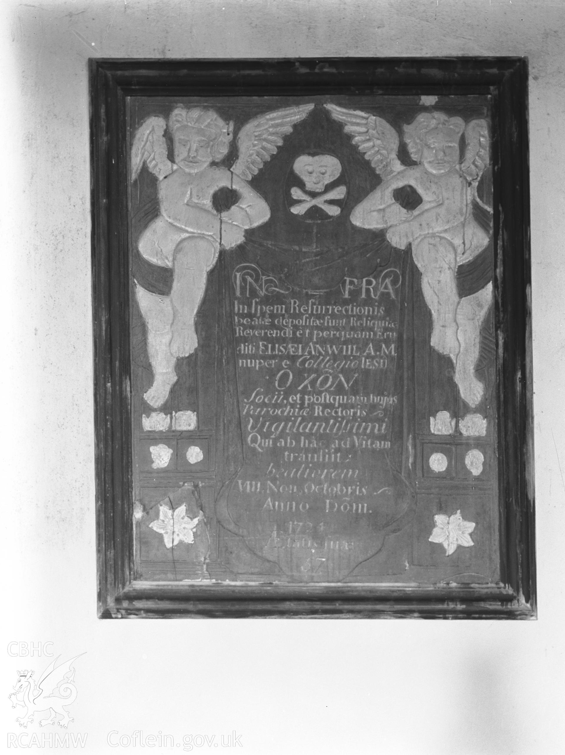 Interior view showing gilded slate memorial.