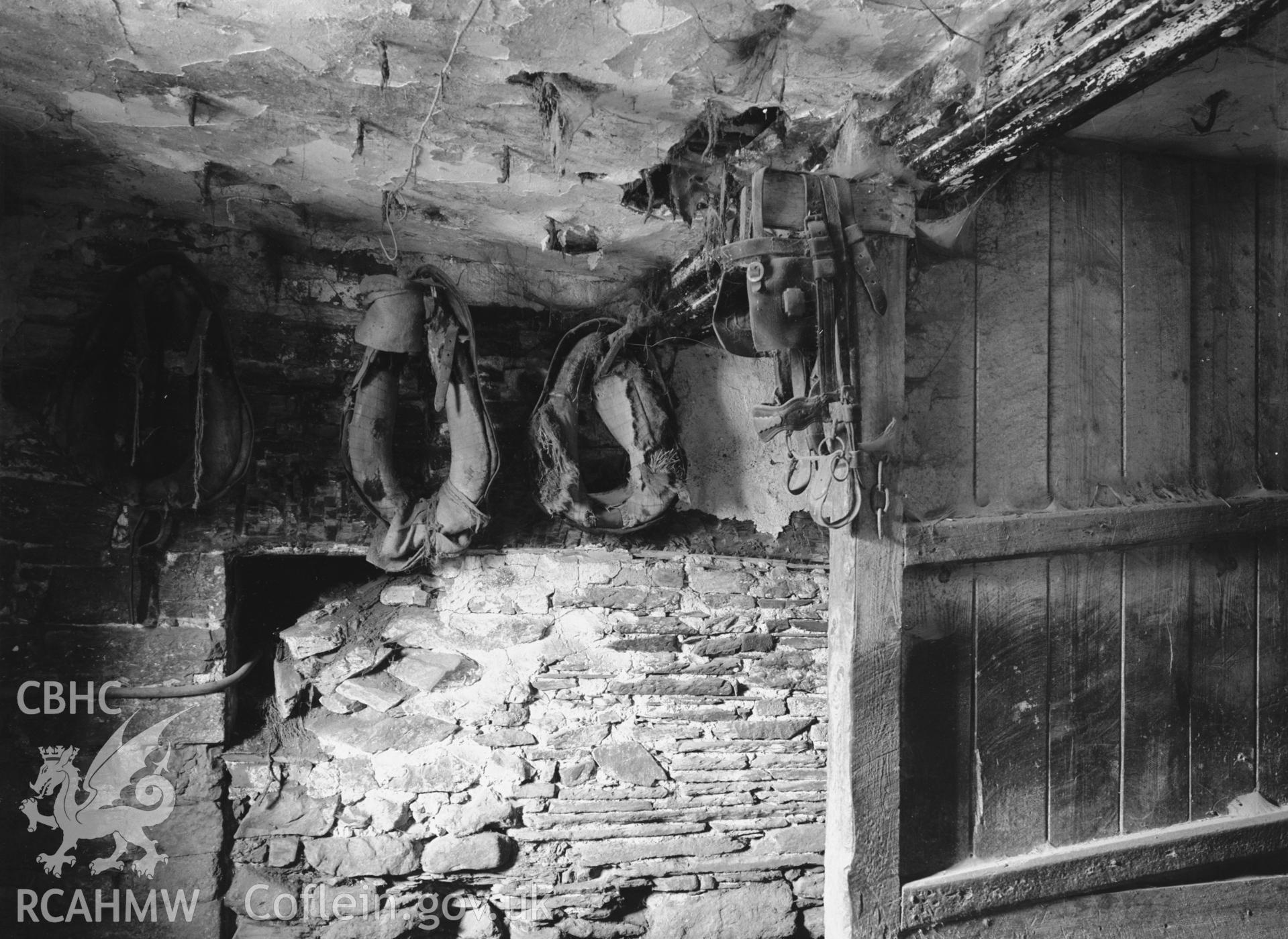 Interior view of the old house showing fireplace and beams