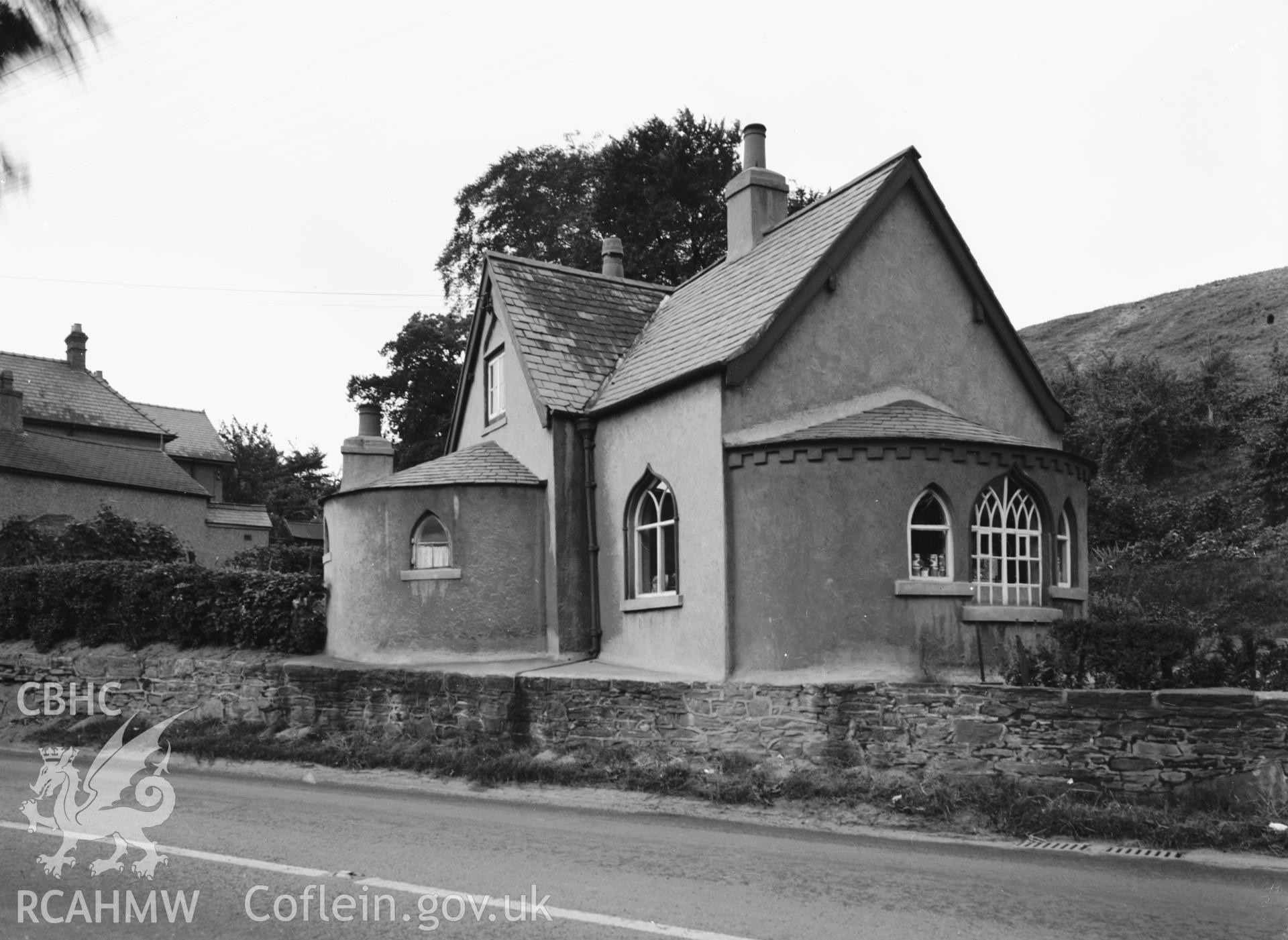 B&W photograph showing exterior view of Old Toll House, Marford, taken by G.B. Mason, 1952.