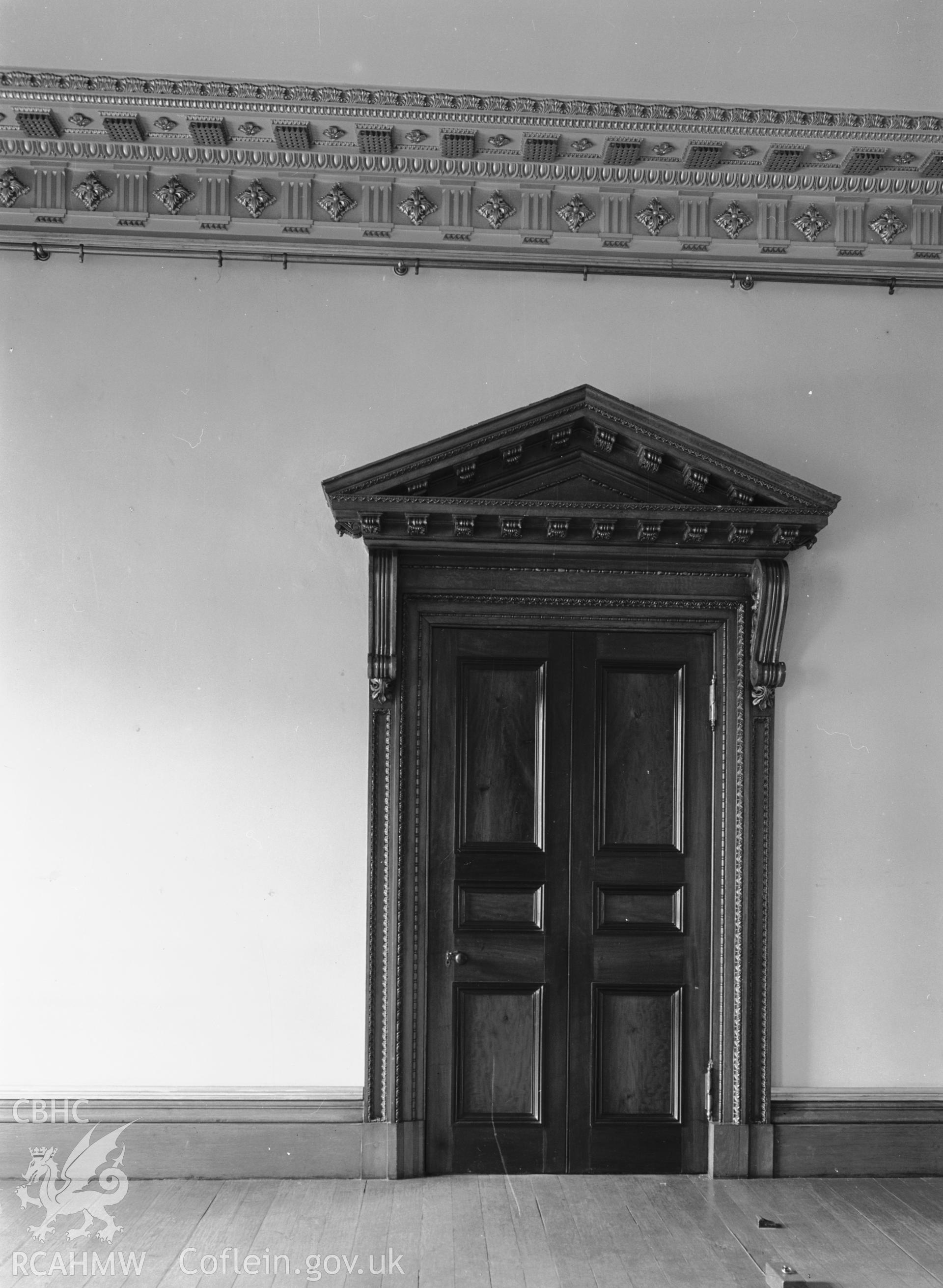 Interior view showing door and cornice in drawing room at Glynllifon Hall