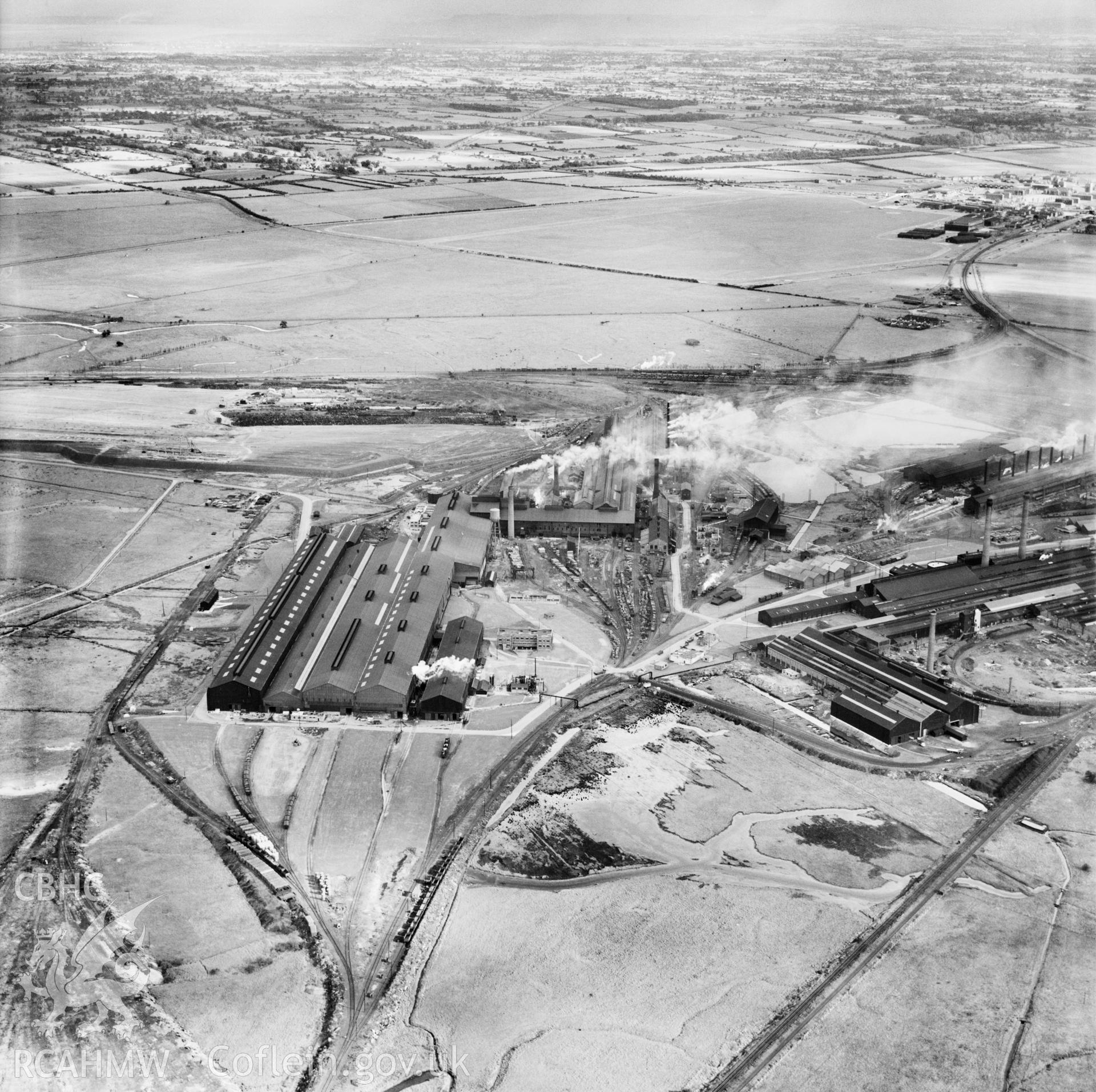 View of the dredging of the Shotton steelworks site (commissioned by Westminster Dredging Co.). Oblique aerial photograph, 5?" cut roll film.