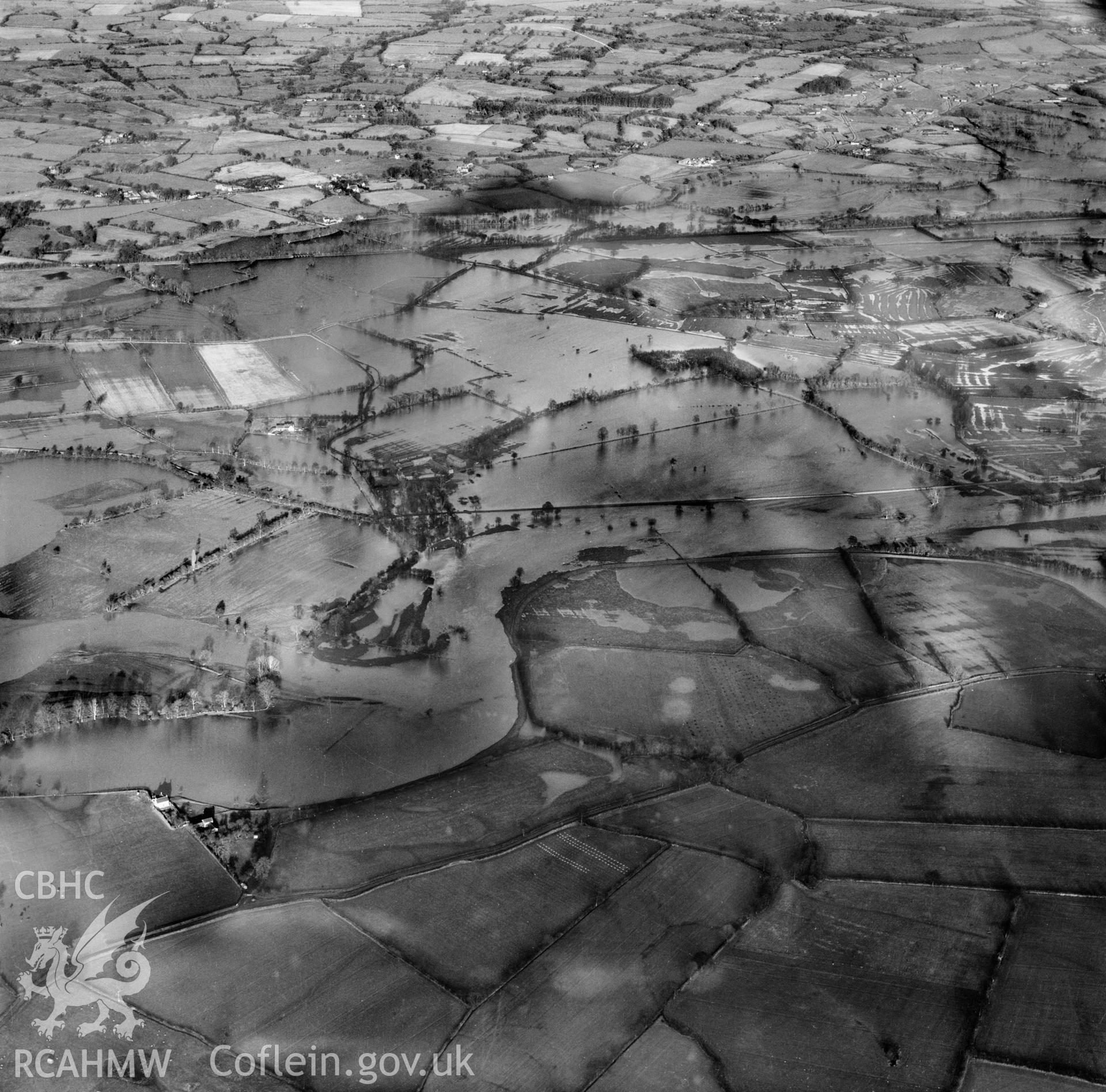 View of the river Severn in flood in the Criggion and Breiddan Hill area. Oblique aerial photograph, 5?" cut roll film.