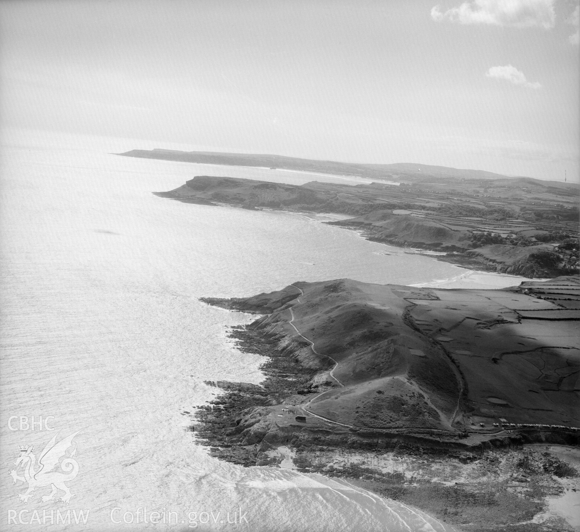 View of coastline West from Mumbles showing Langland golf course