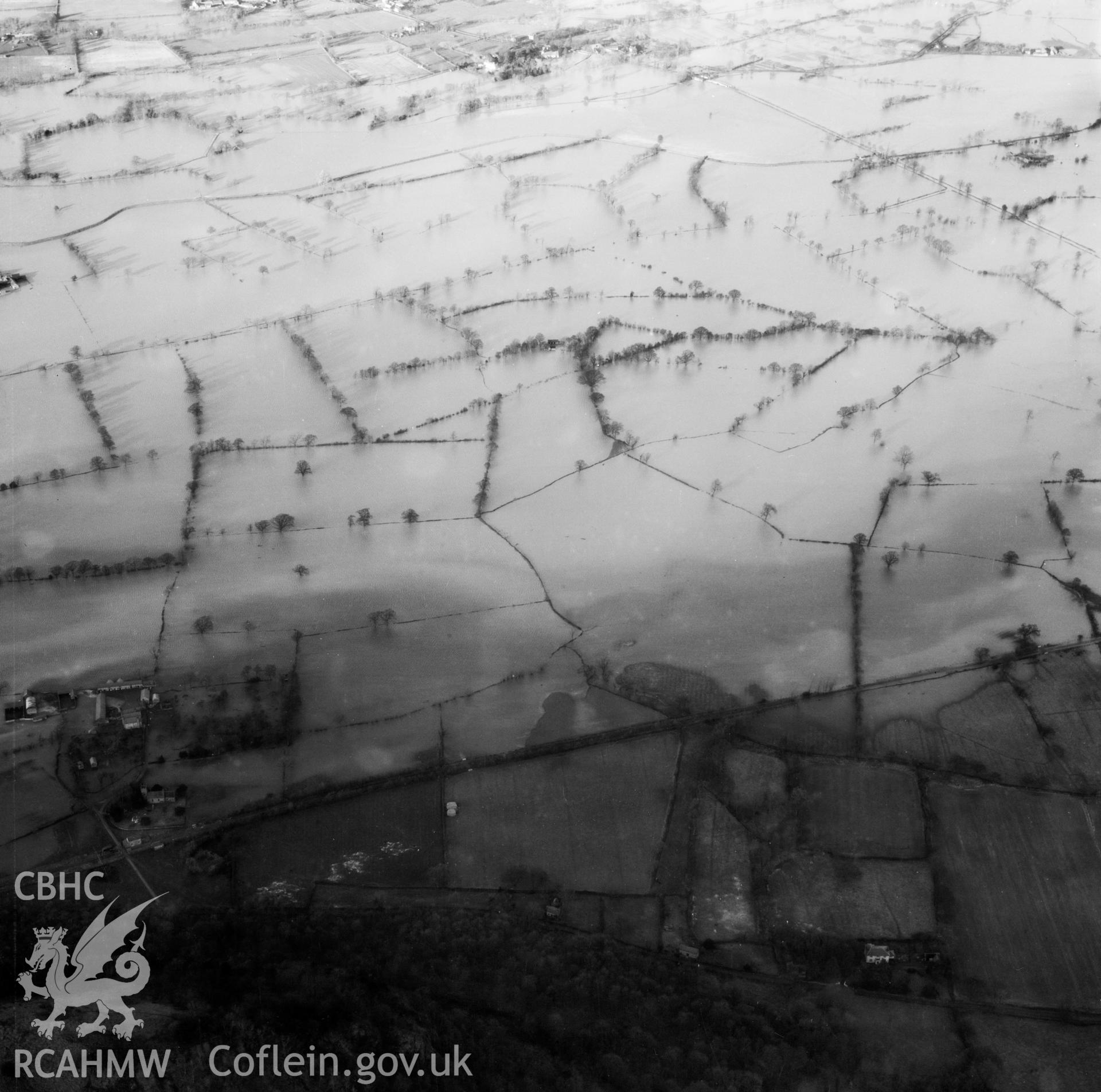 View of the river Severn in flood in the Criggion and Breiddan Hill area. Oblique aerial photograph, 5?" cut roll film.