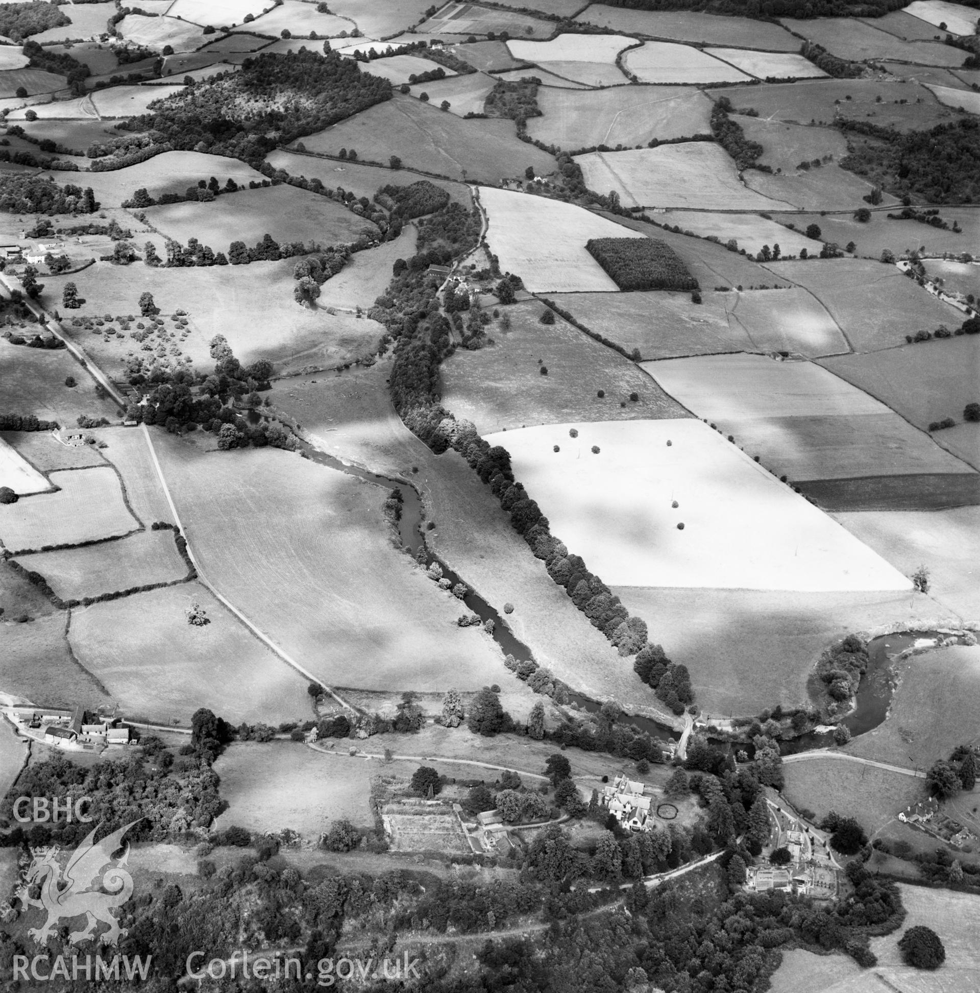 Distant view of Rockfield Park and grounds, commissioned by D.H.Lloyd Esq., Bedford Cottage, Bury Road, Newmarket. Oblique aerial photograph, 5?" cut roll film.