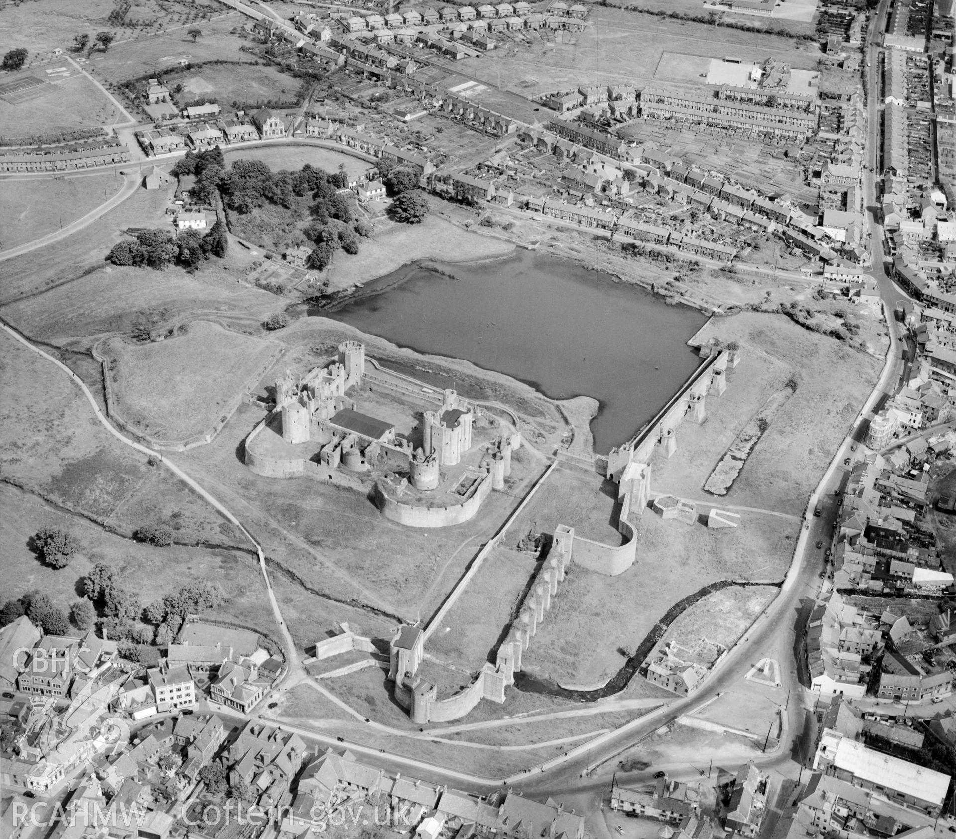 View of Caerphilly showing castle. Oblique aerial photograph, 5?" cut roll film.