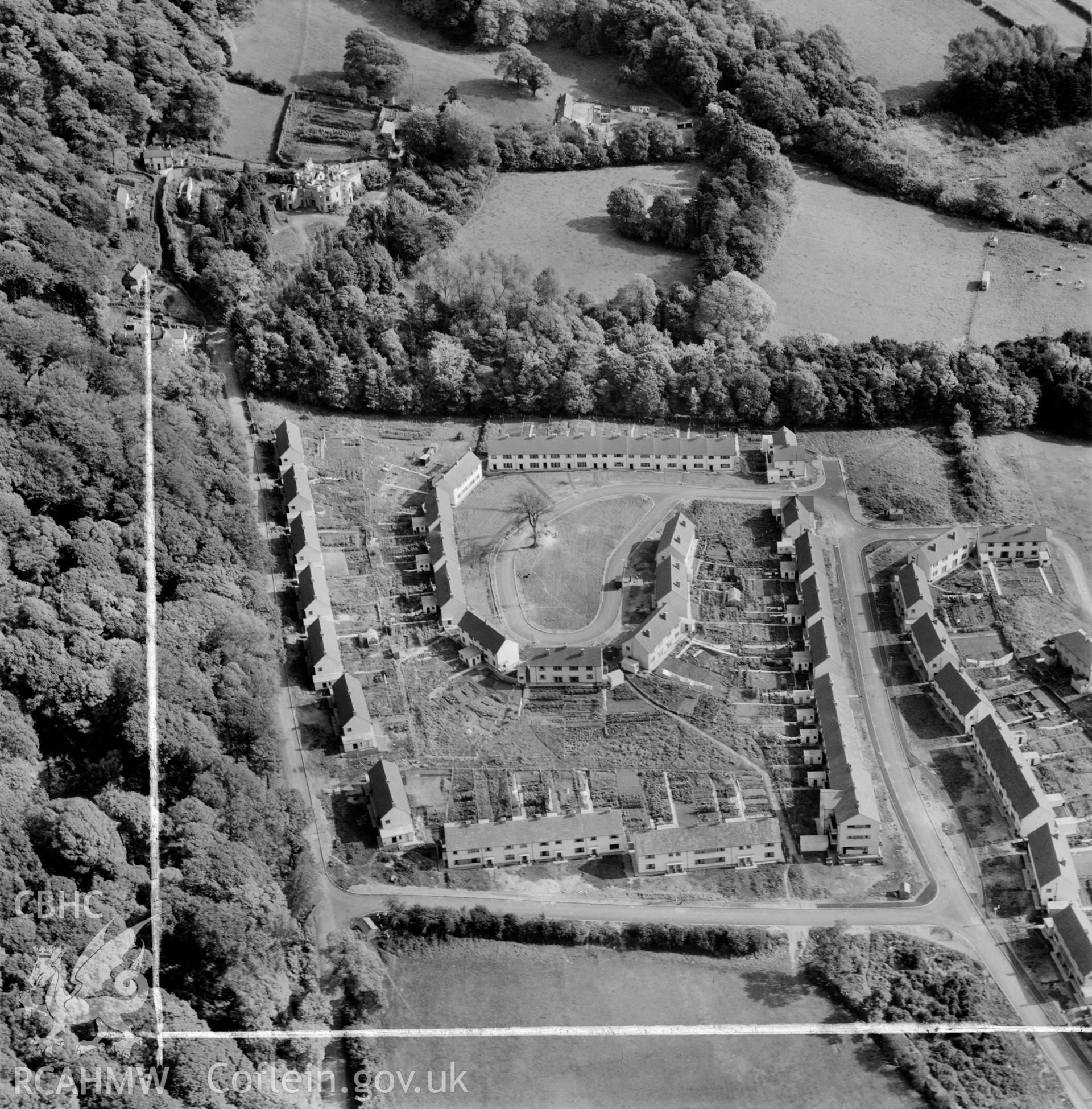 View of new-built estate at Aberavon showing distant view of Baglan House in ruins