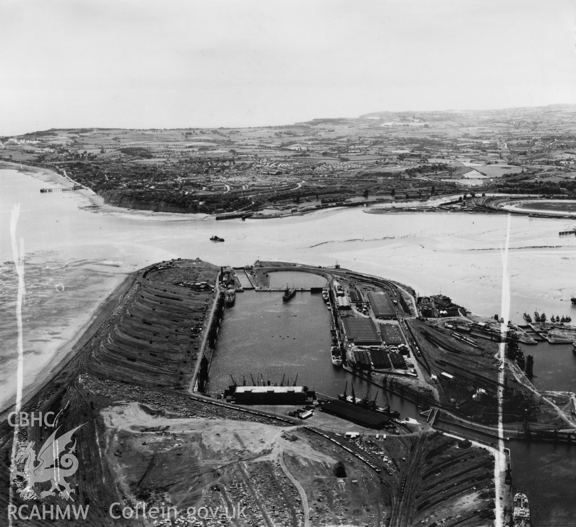 View of Queen Alexandra dock from the east with Penarth in the distance. Oblique aerial photograph, 5?" cut roll film.