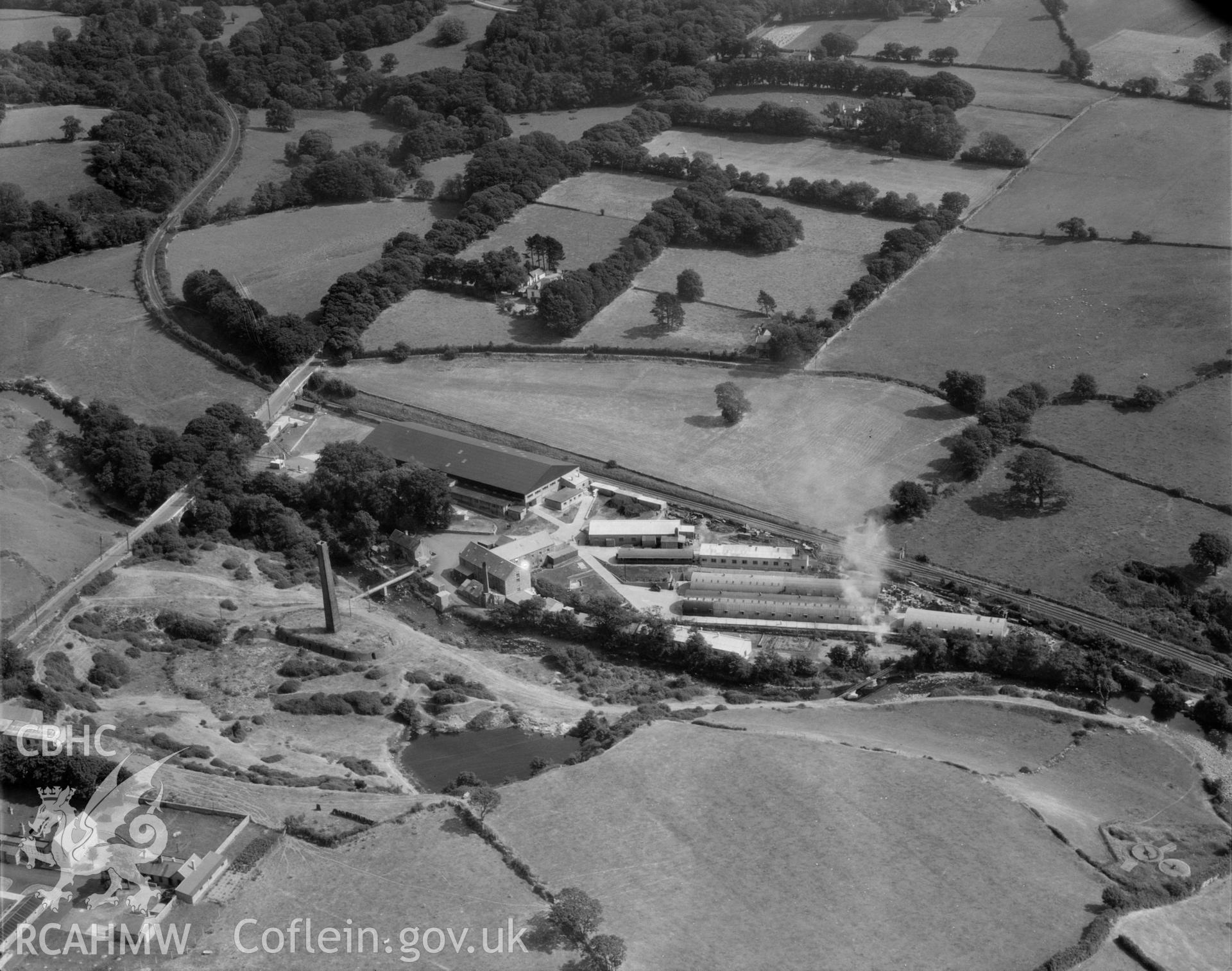 View of factory complex at Peblig Mill, Caernarfon, showing the mill, remains of brickworks, nissan huts and other works buildings