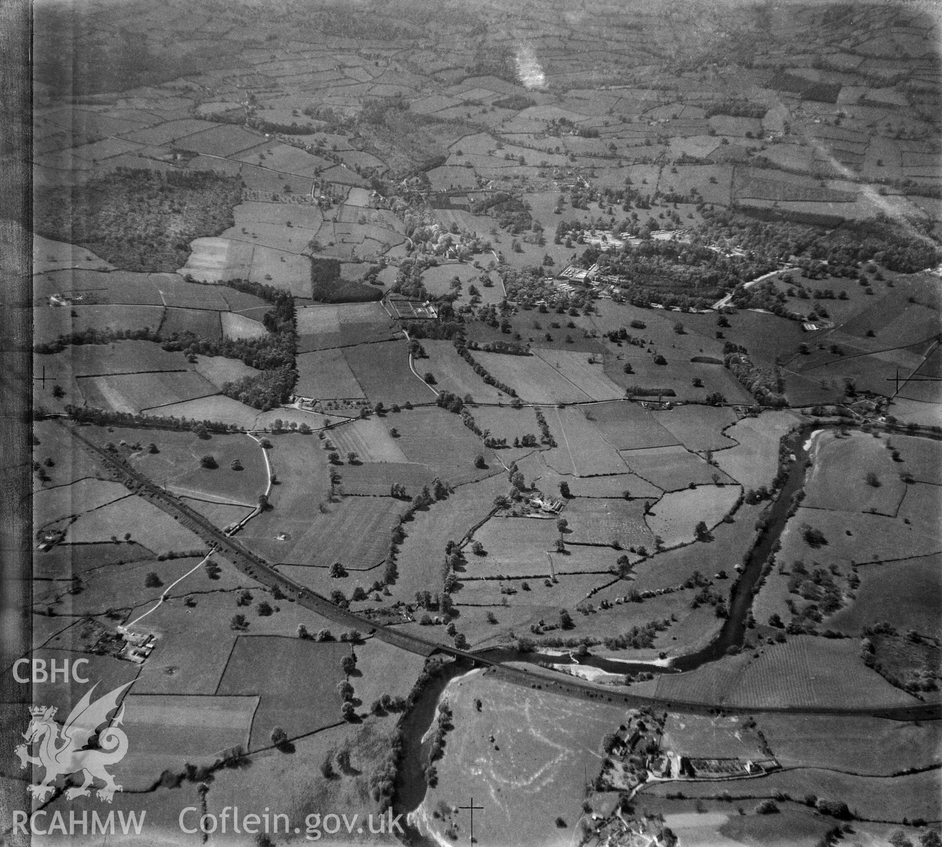 View of landscape south of Abergavenny showing the railway and river Usk