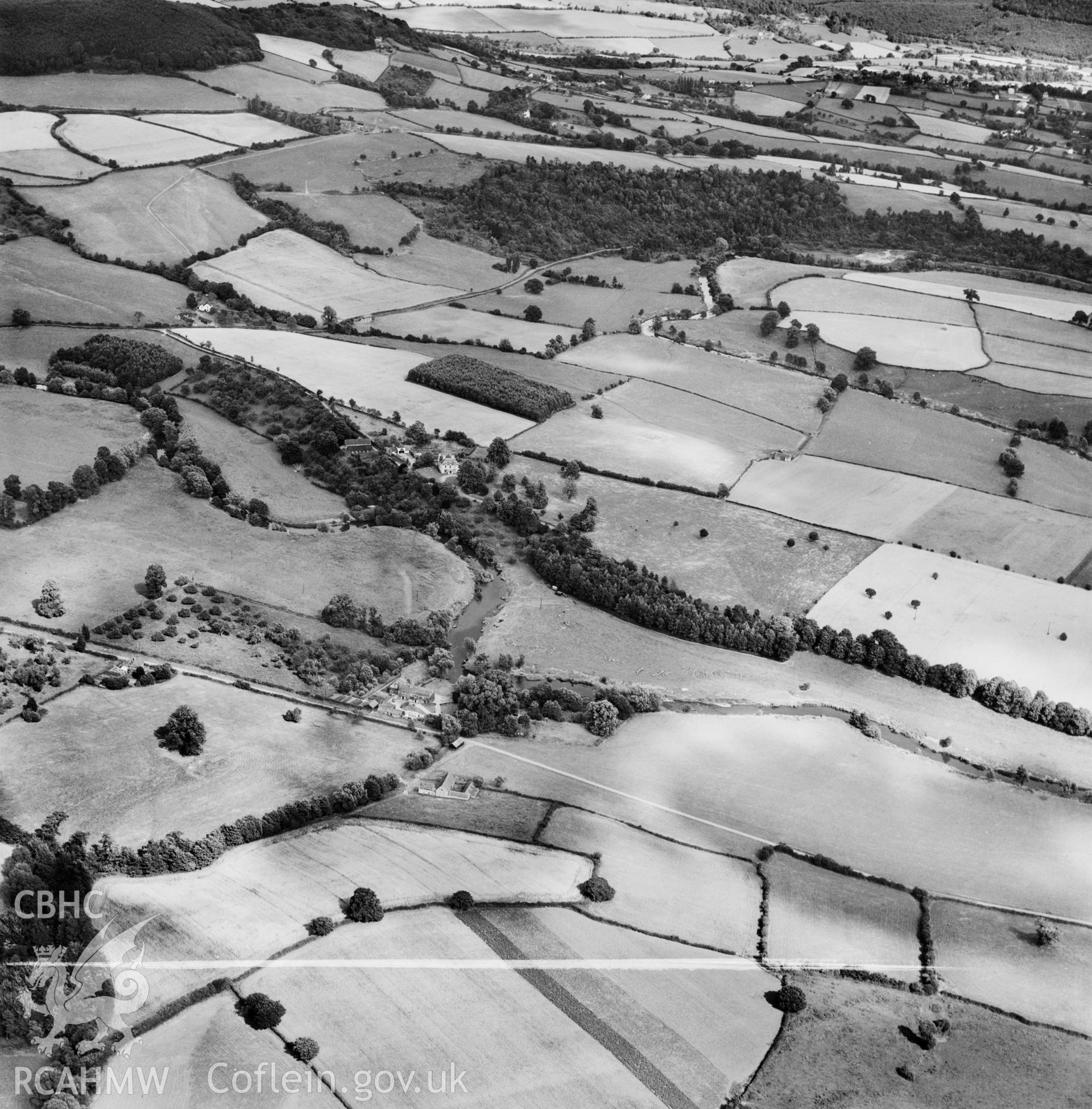 Distant view of Rockfield Park and grounds, commissioned by D.H.Lloyd Esq., Bedford Cottage, Bury Road, Newmarket. Oblique aerial photograph, 5?" cut roll film.