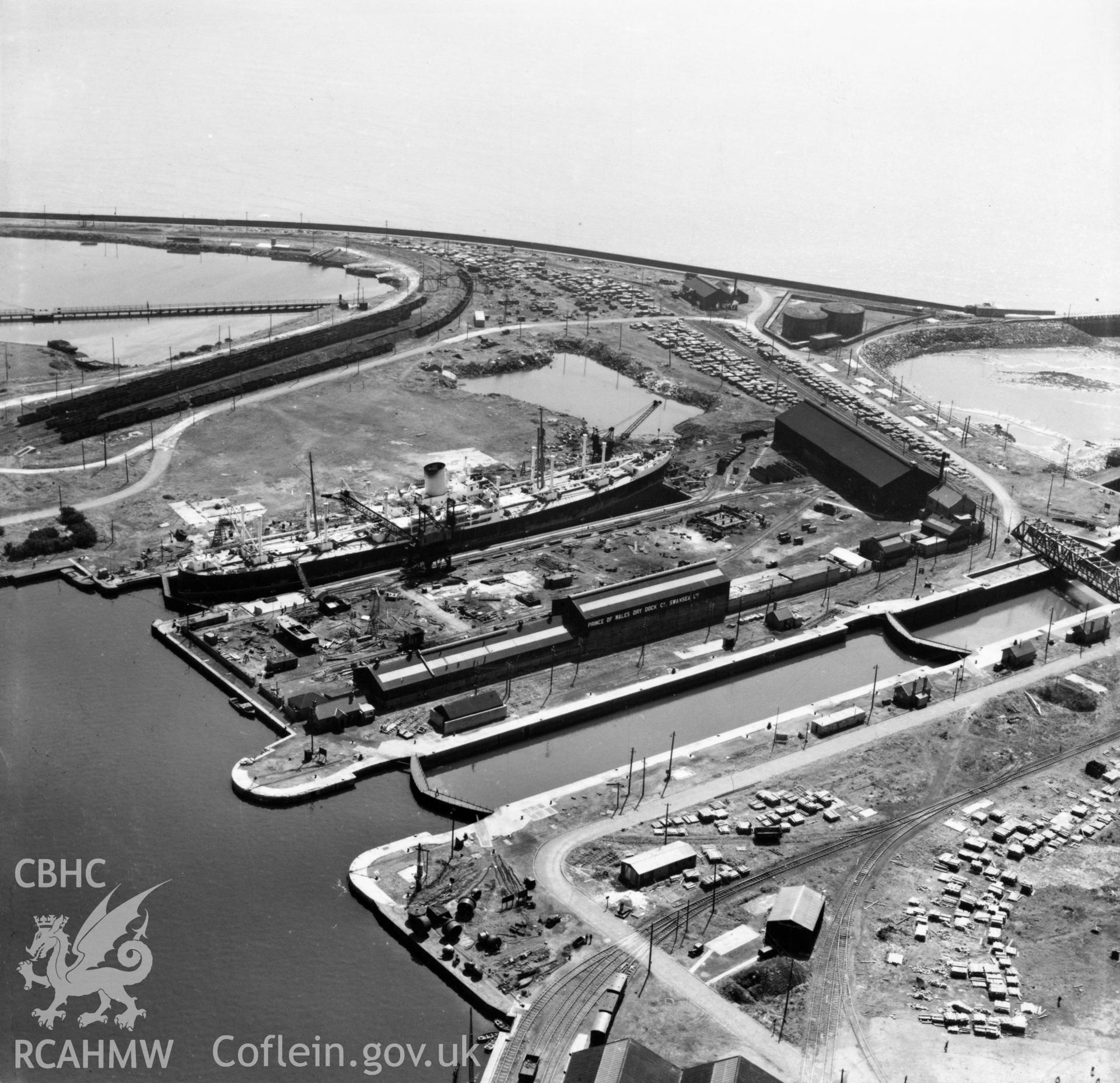 View of Palmers dry dock, Prince of Wales Dry Dock Co. Ltd., Swansea. Oblique aerial photograph, 5?" cut roll film.