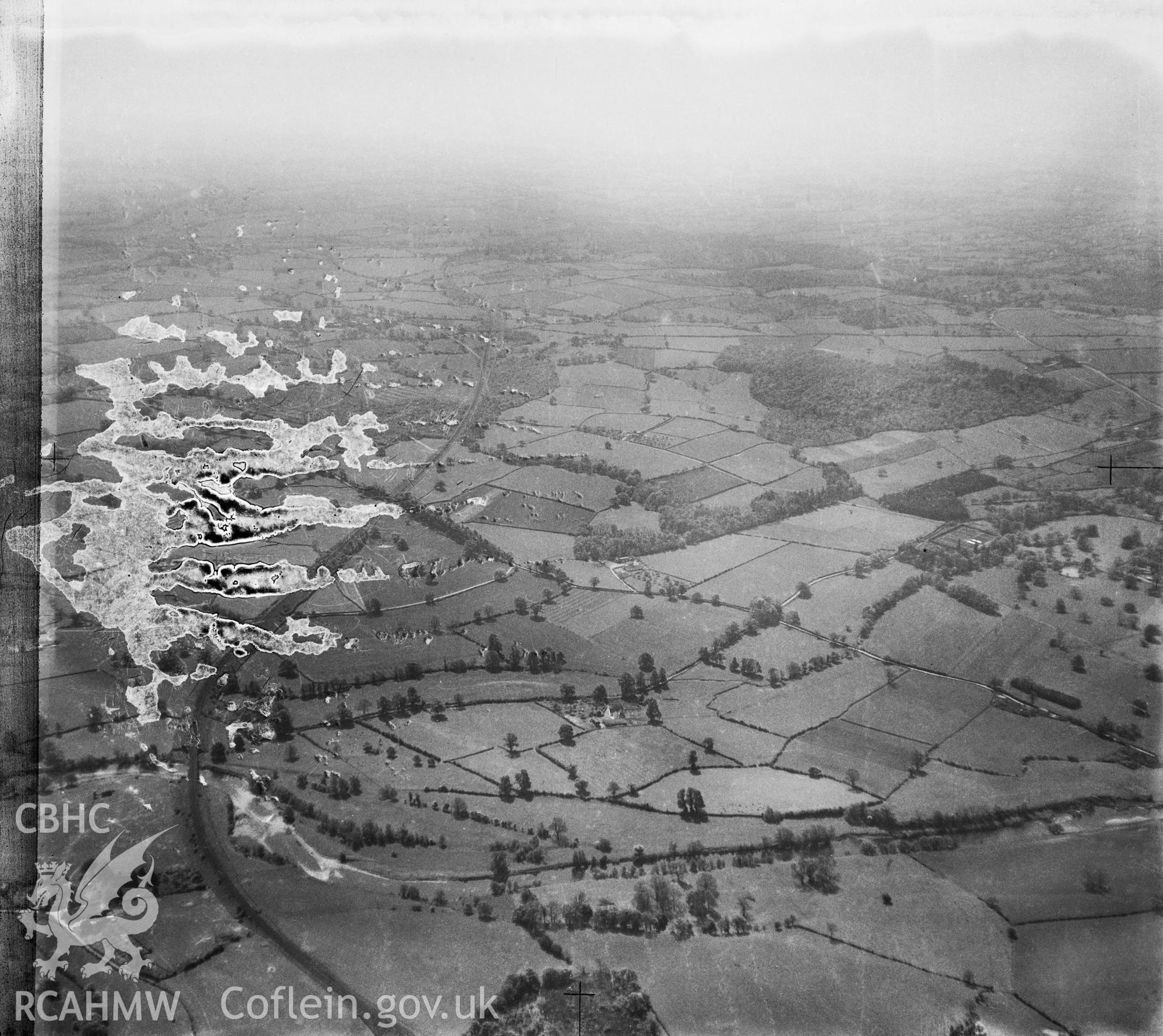View of landscape south of Abergavenny showing the railway and river Usk