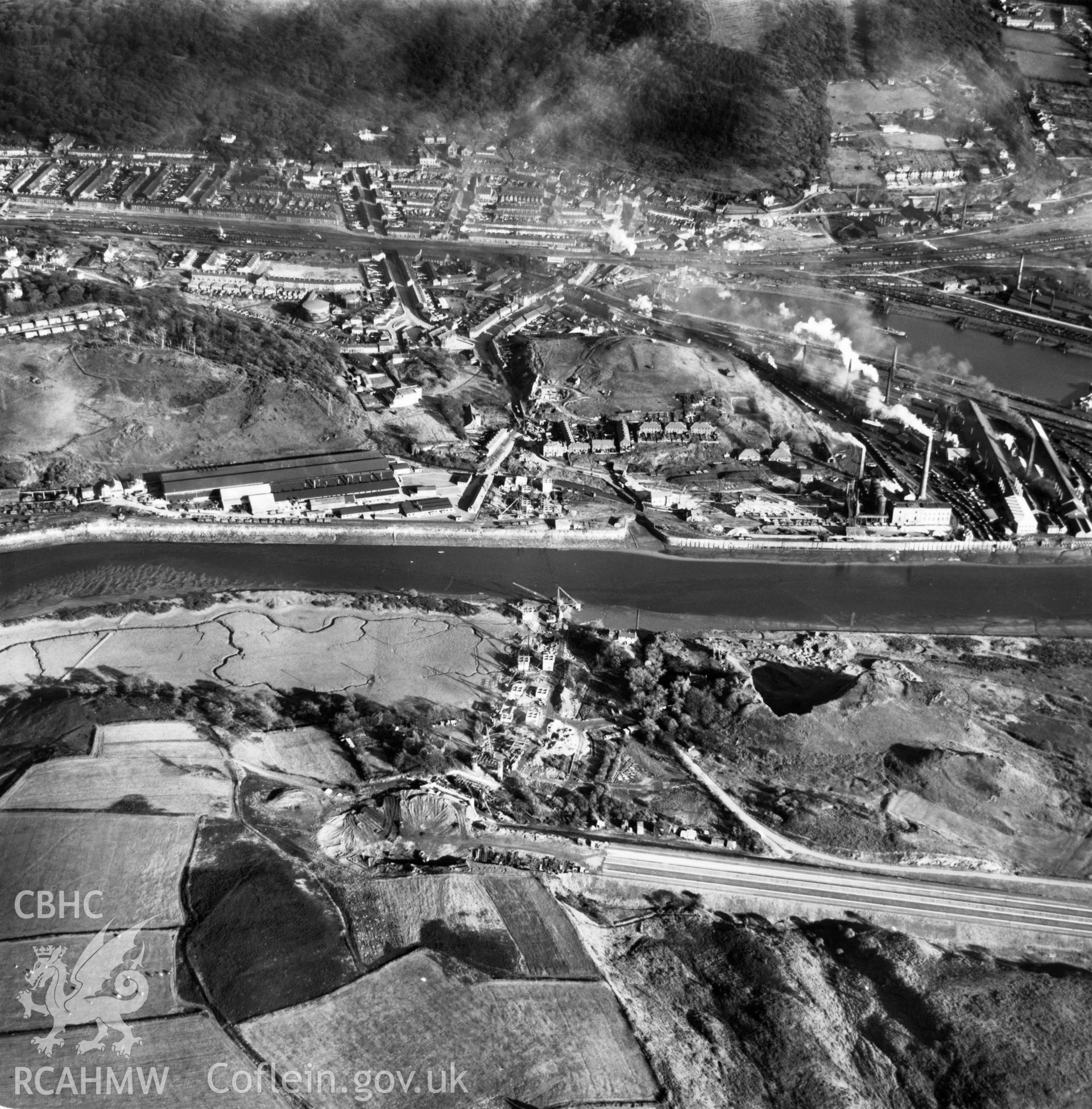 View of the Cleveland Bridge & Engineering Co. Ltd. bridge under construction at Briton Ferry. Oblique aerial photograph, 5?" cut roll film.