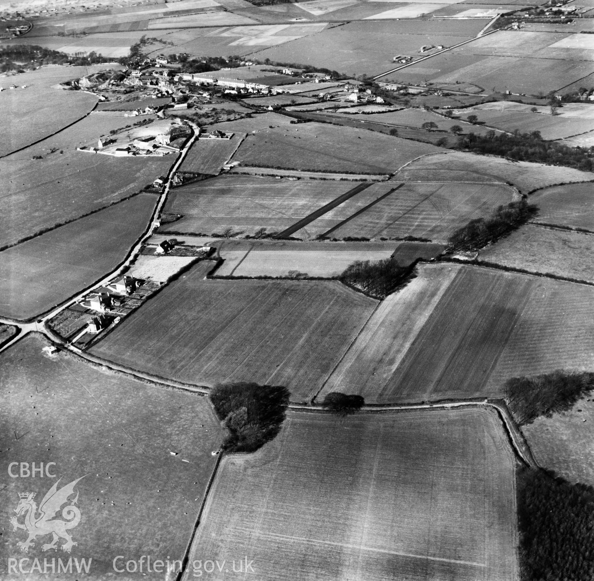 View of Gwespyr showing Bryn Llystyn. Oblique aerial photograph, 5?" cut roll film.