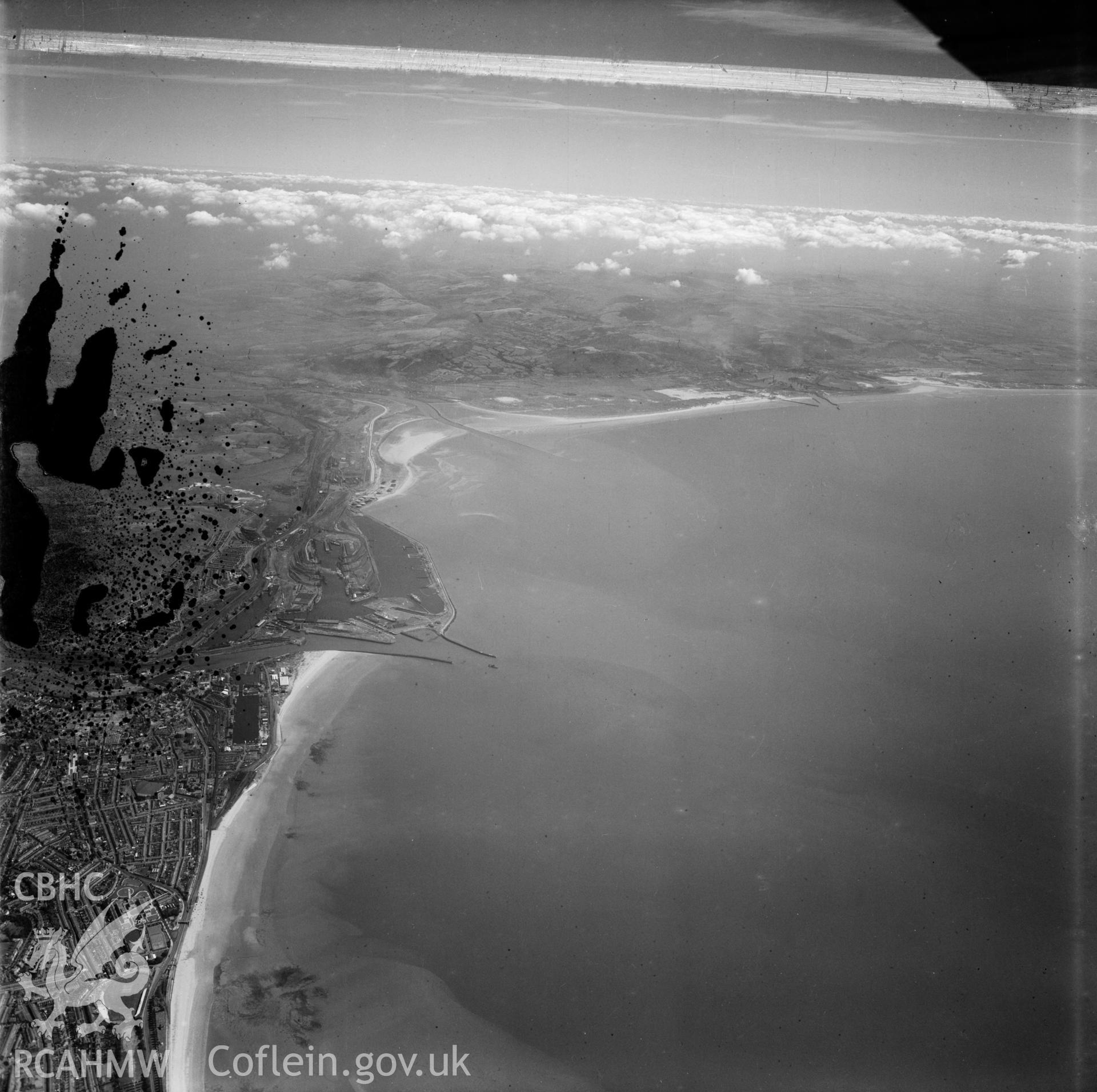 Distant view of  Swansea showing docks