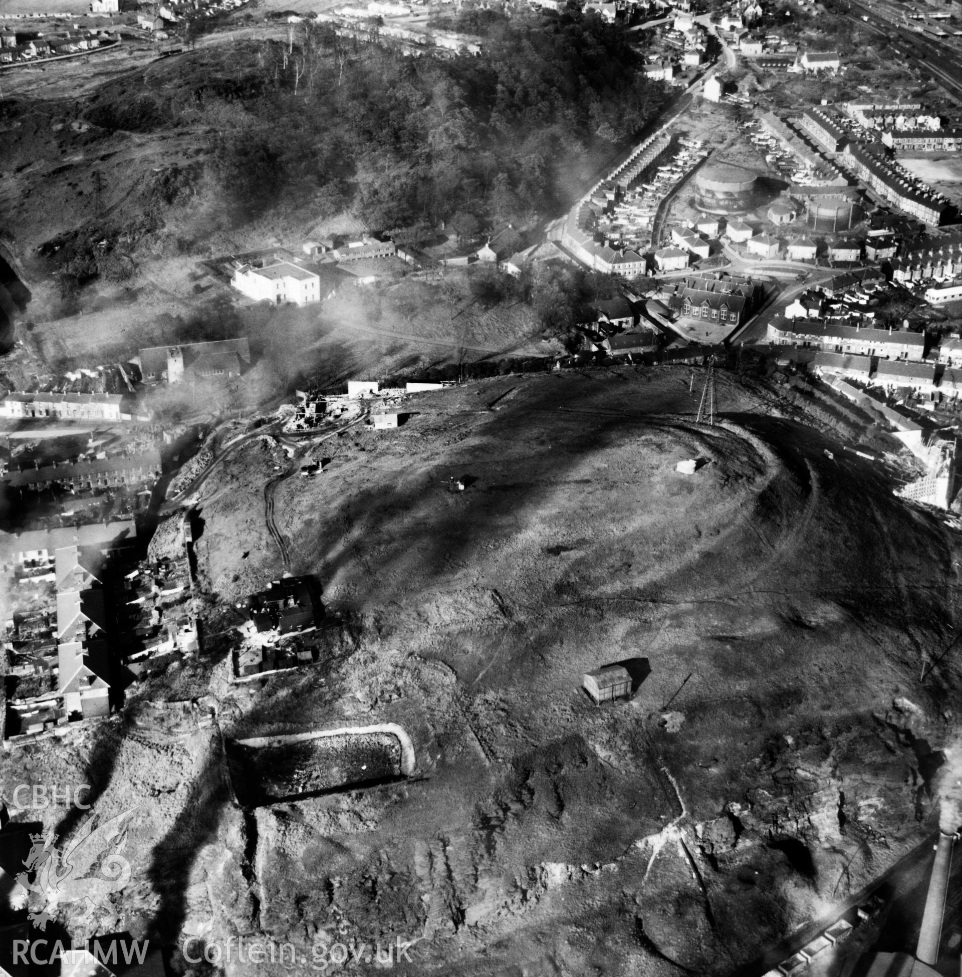 View of Briton Ferry and the Cleveland Bridge under construction. Oblique aerial photograph, 5?" cut roll film.